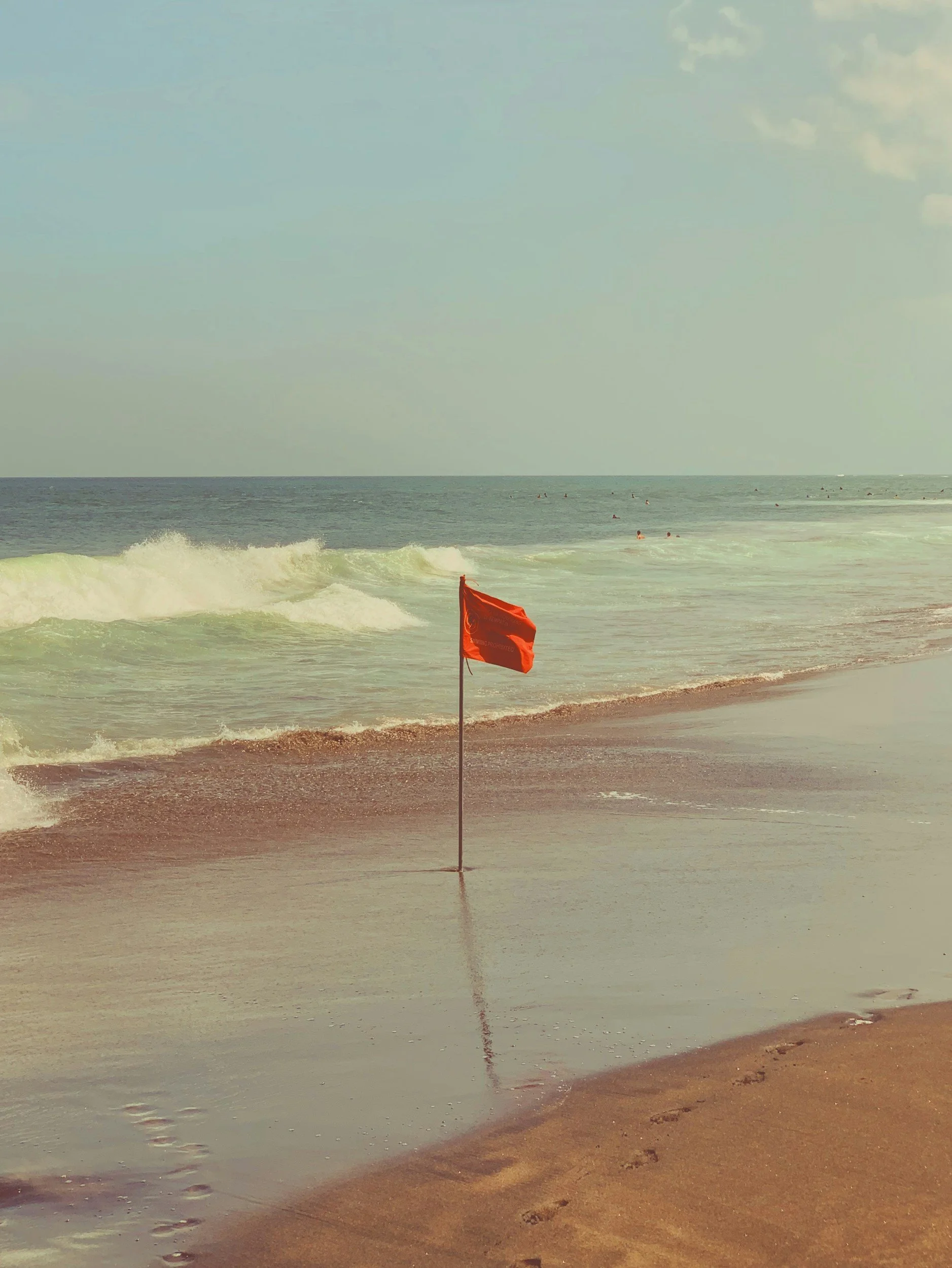 Red flag placed in sand on a beach | ADHD Therapy in Colorado Springs | Executive functioning Therapy | Colorado Springs Therapy | 80924 | 80925 | 80907