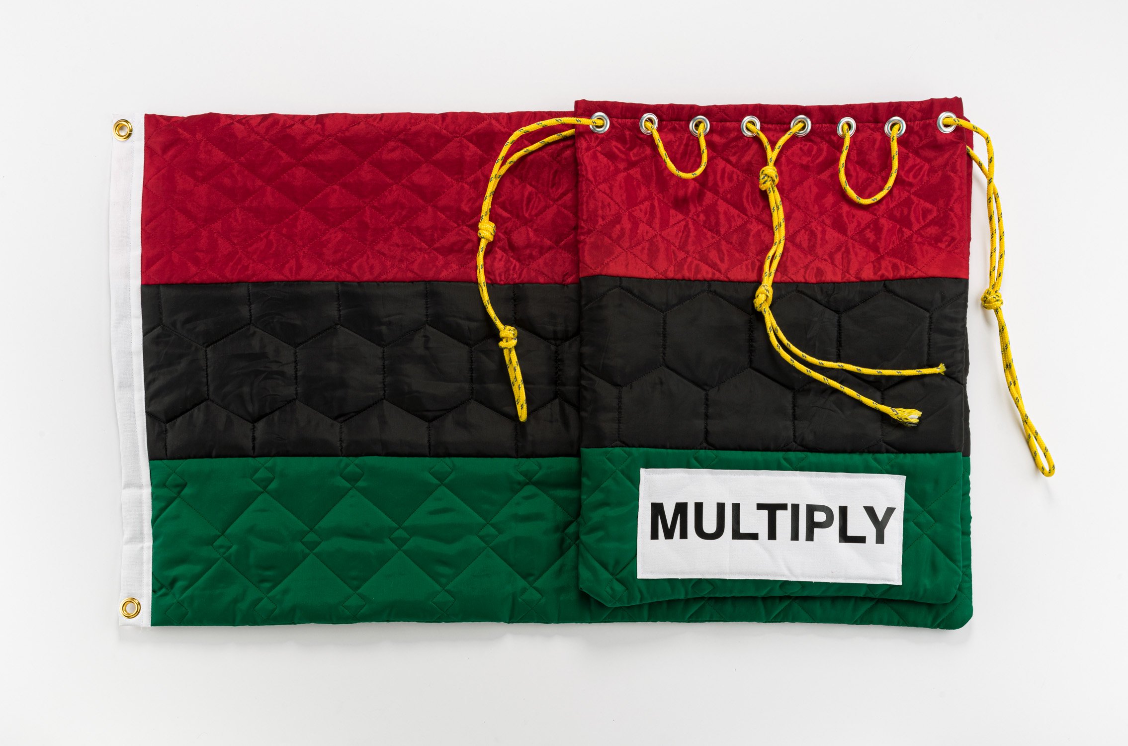 STASH: Quilted Nylon, Metal Grommet, Nylon Rope