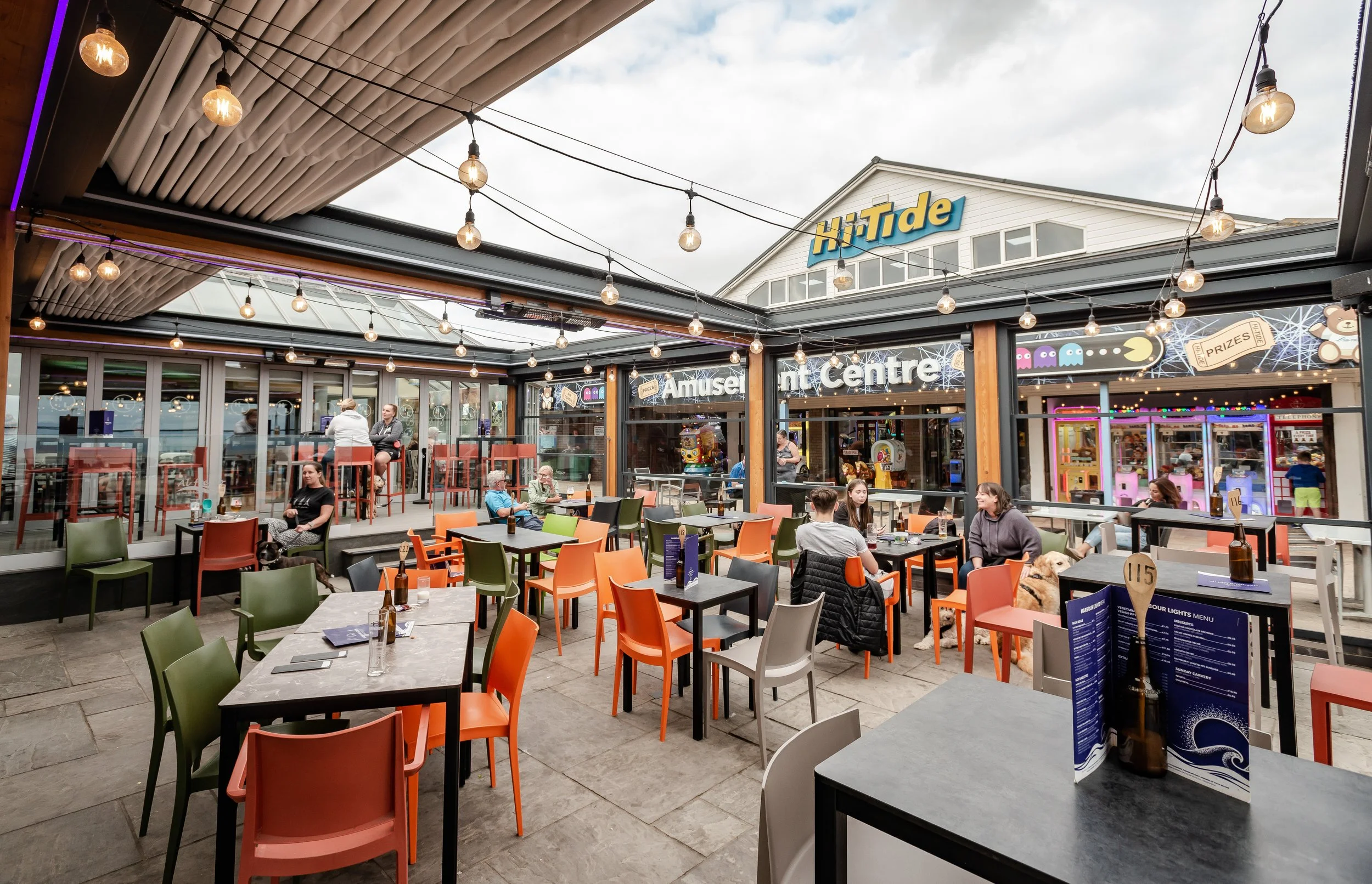 wood-frame-retractable-roofed-courtyard-hi-tide-courtyard-porthcawl