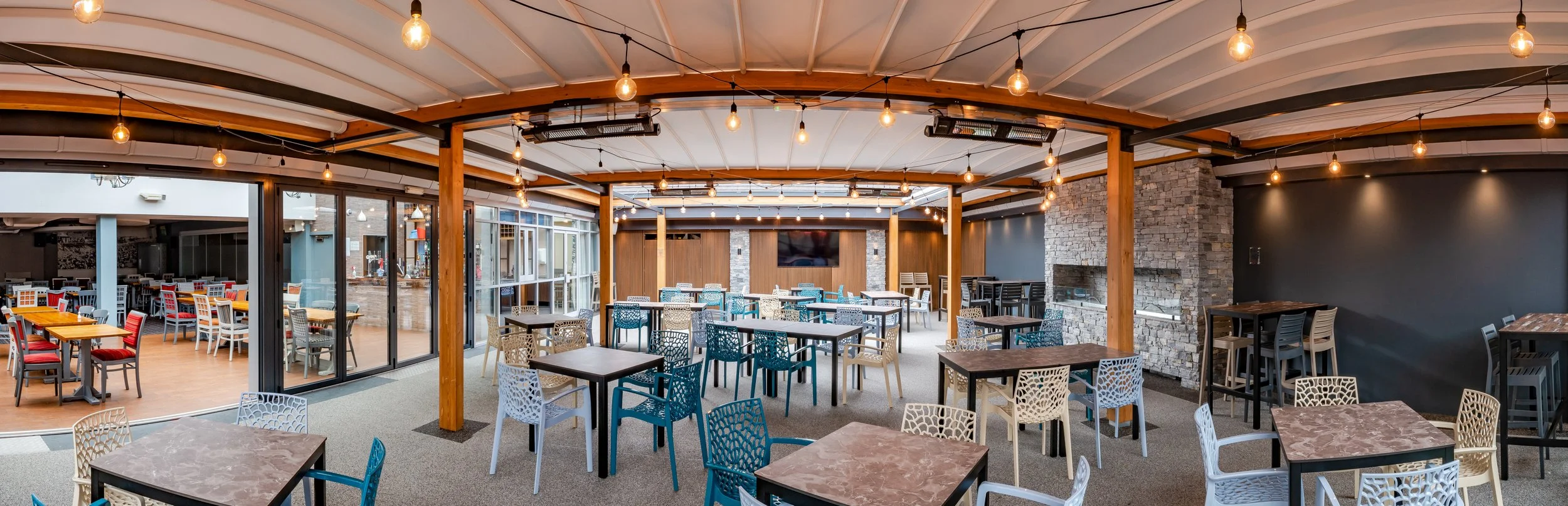 wood-frame-retractable-roofed-courtyard-hi-tide-courtyard-porthcawl