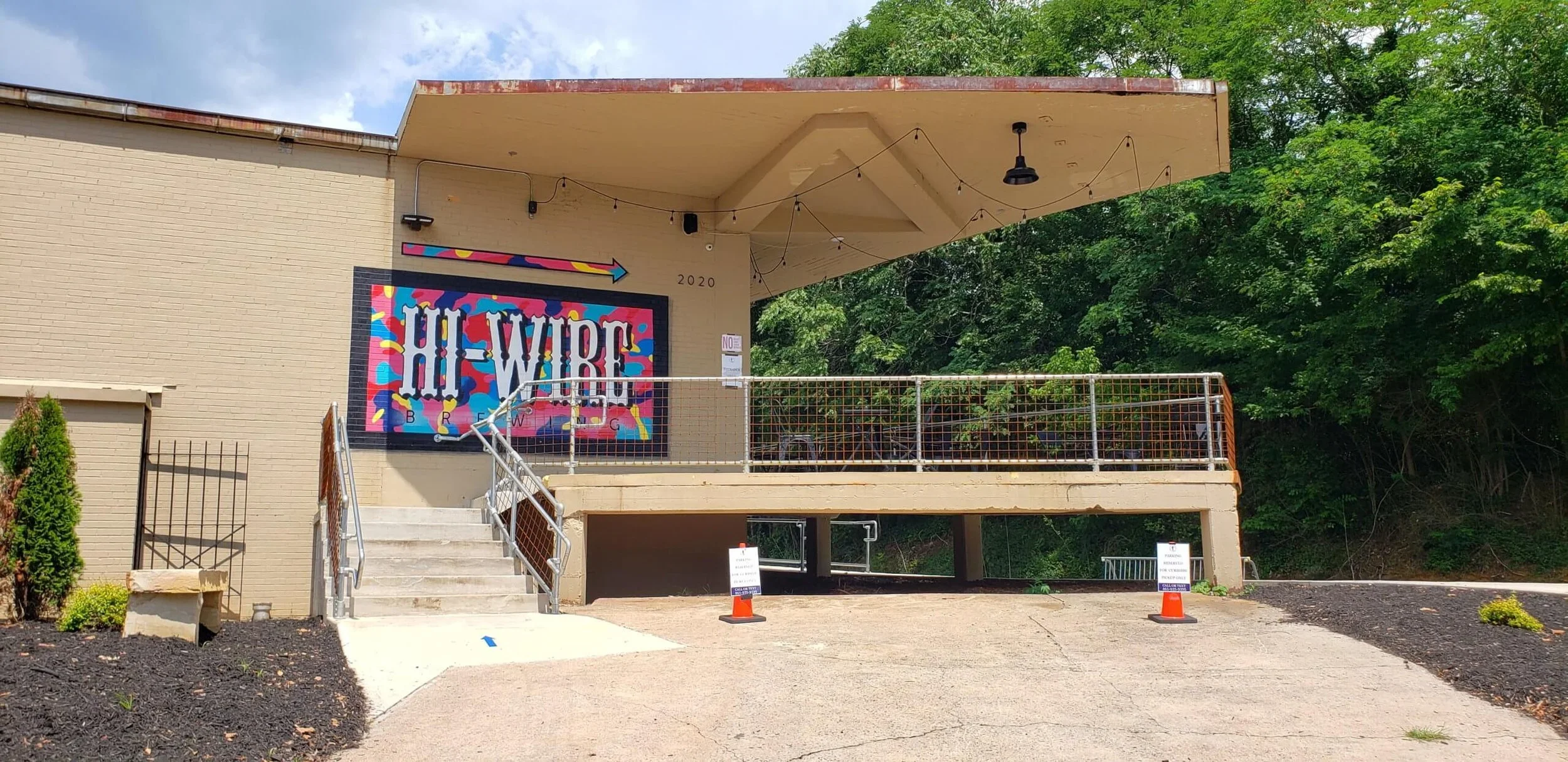 The colorful entrance and outdoor patio at Hi-Wire Brewing, a welcoming South Knoxville gathering place.