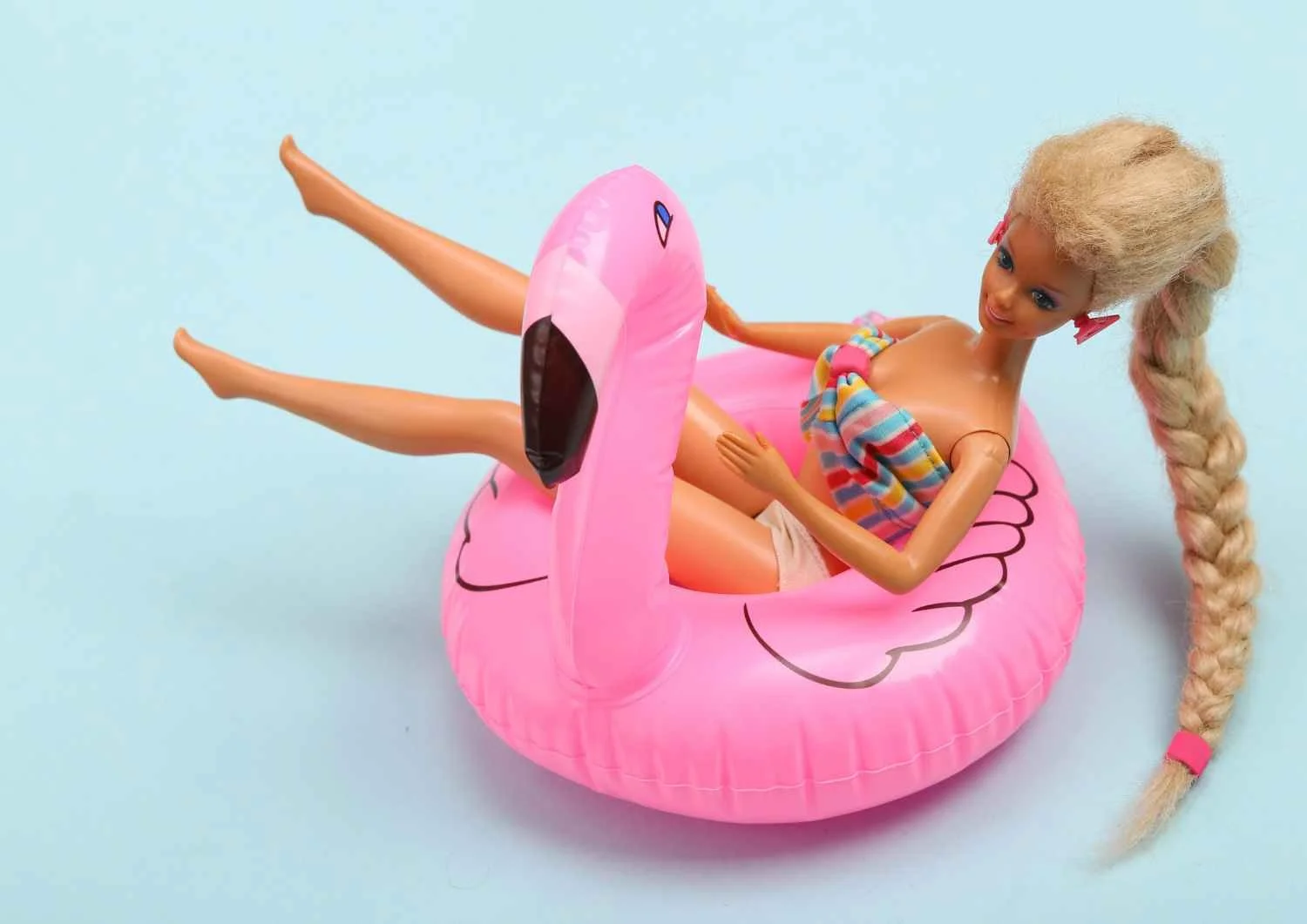 barbie in a blowup flamingo