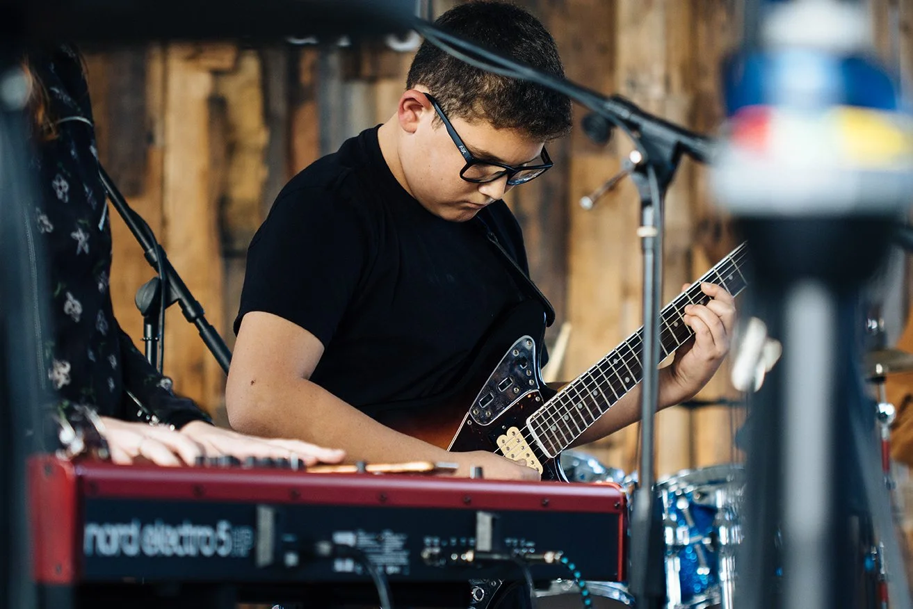 WYNWOOD YARD LIVE SHOW GUITAR PLAYER.jpg