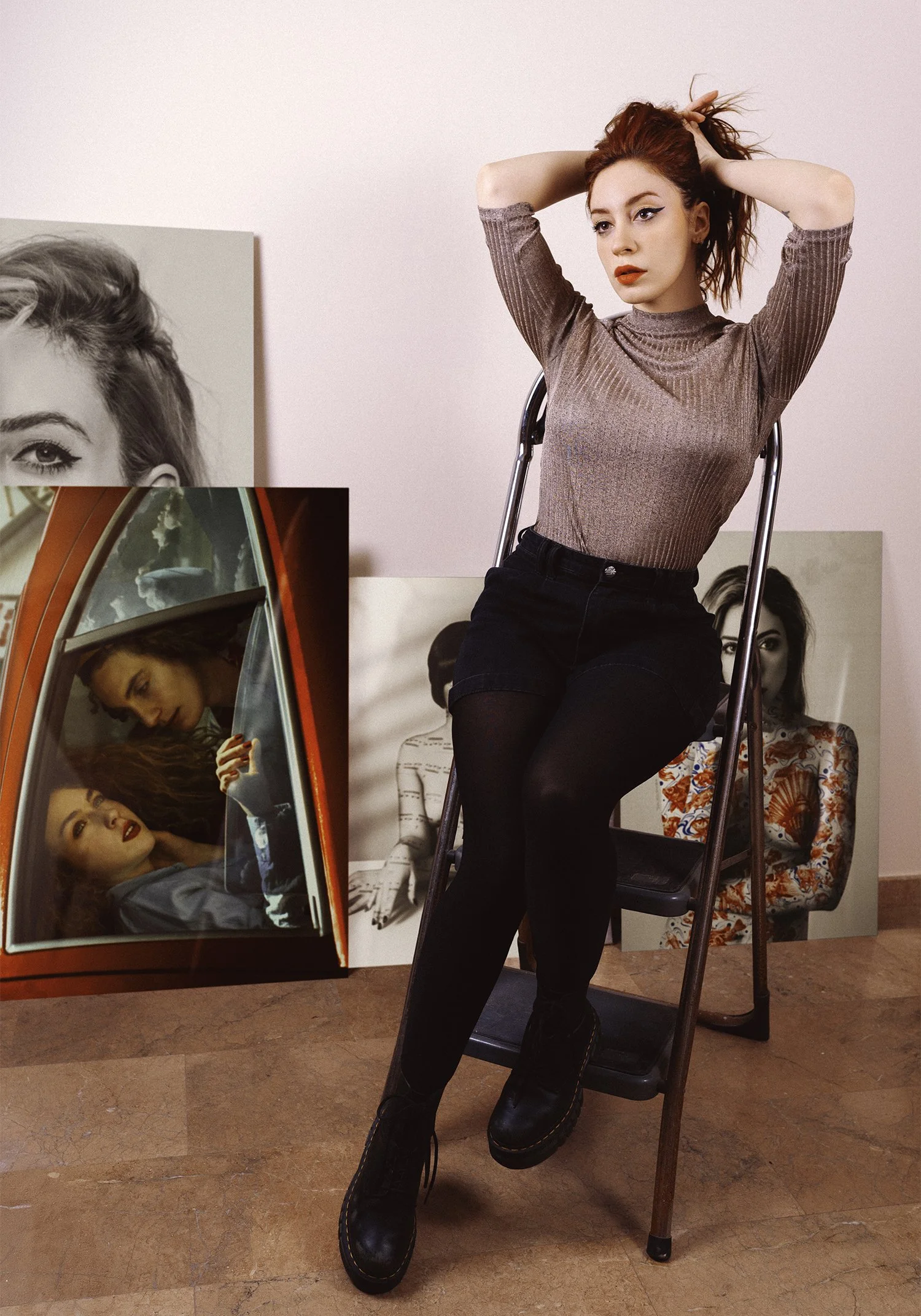 Lídia Vives surrounded by her photographic works