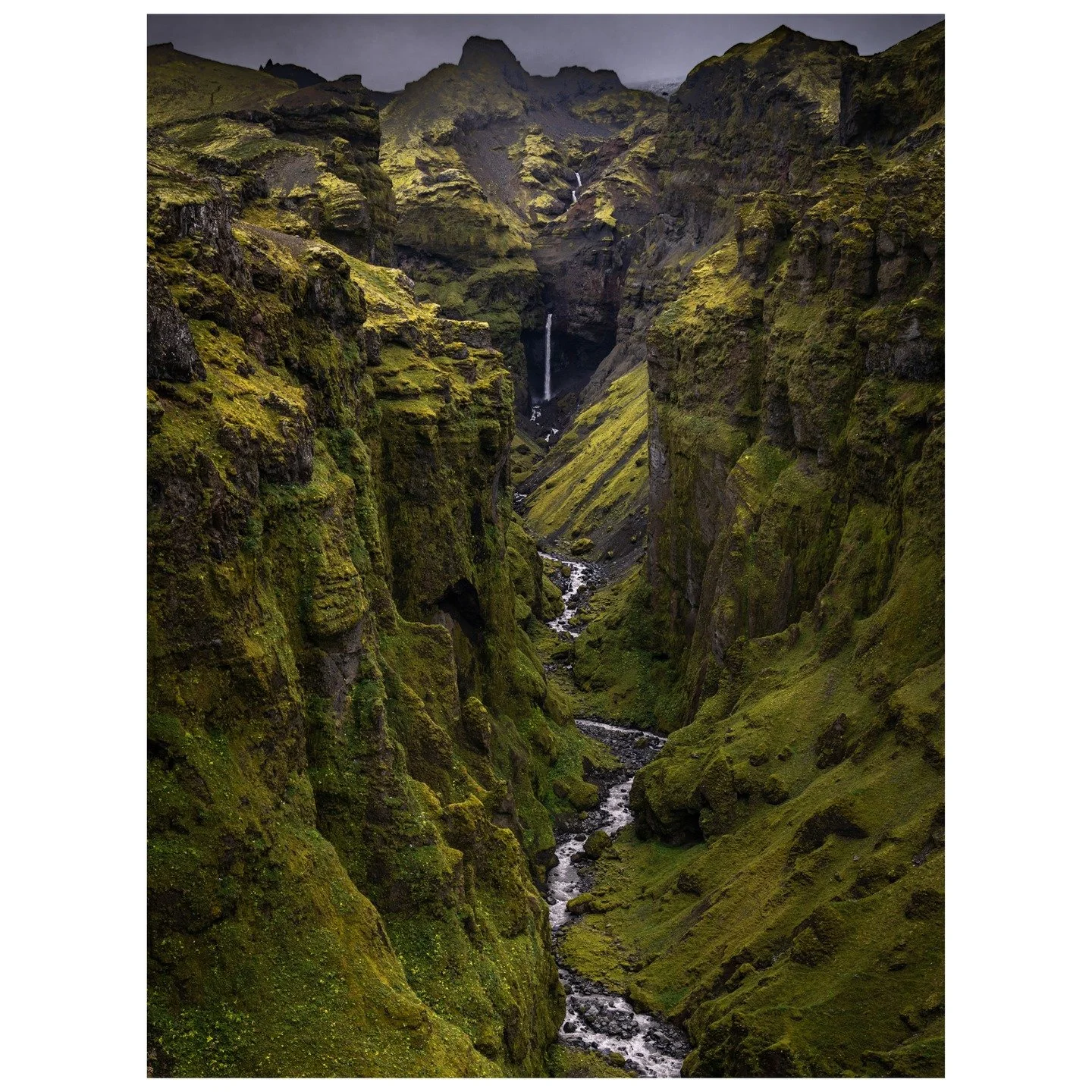 Standing at the edge of Mulagljufur Canyon, you witness a symphony of textures&mdash;velvet moss, jagged stone, and the silver thread of the waterfall. The air hums with wild energy and the silence echoes with adventure. Iceland&rsquo;s raw beauty is