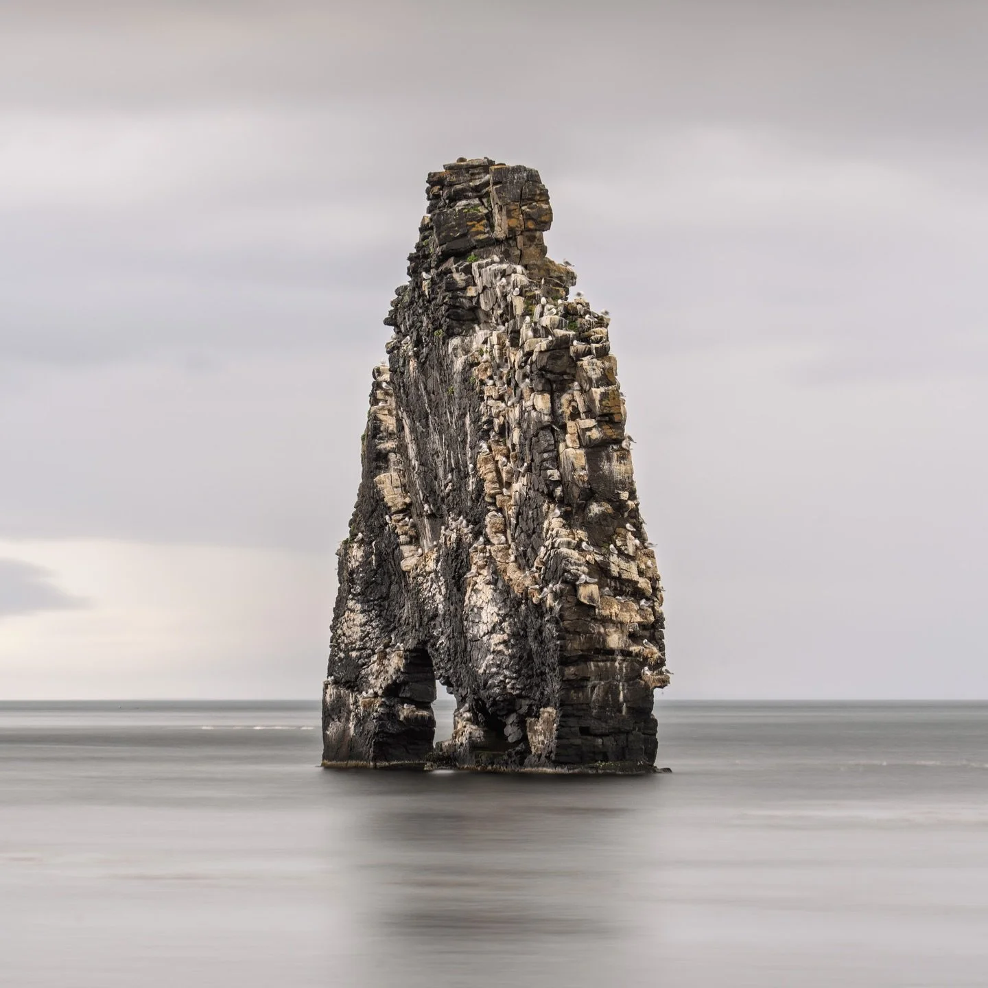 In the vast emptiness, a single rock stands &mdash; sculpted by time, framed by still waters. The quiet strength of nature distilled into pure form and space. Here, every ripple whispers peace, every shadow deepens the silence.
📌 Hv&iacute;tserkur, 