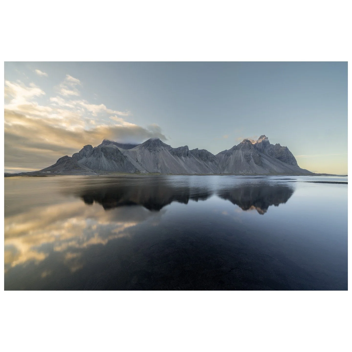 Standing at Stokksnes, watching the evening light dance across Vestrahorn's jagged ridges, you realize why photographers return here season after season. This dramatic peak, sculpted by volcanic forces over millions of years, creates one of nature's 