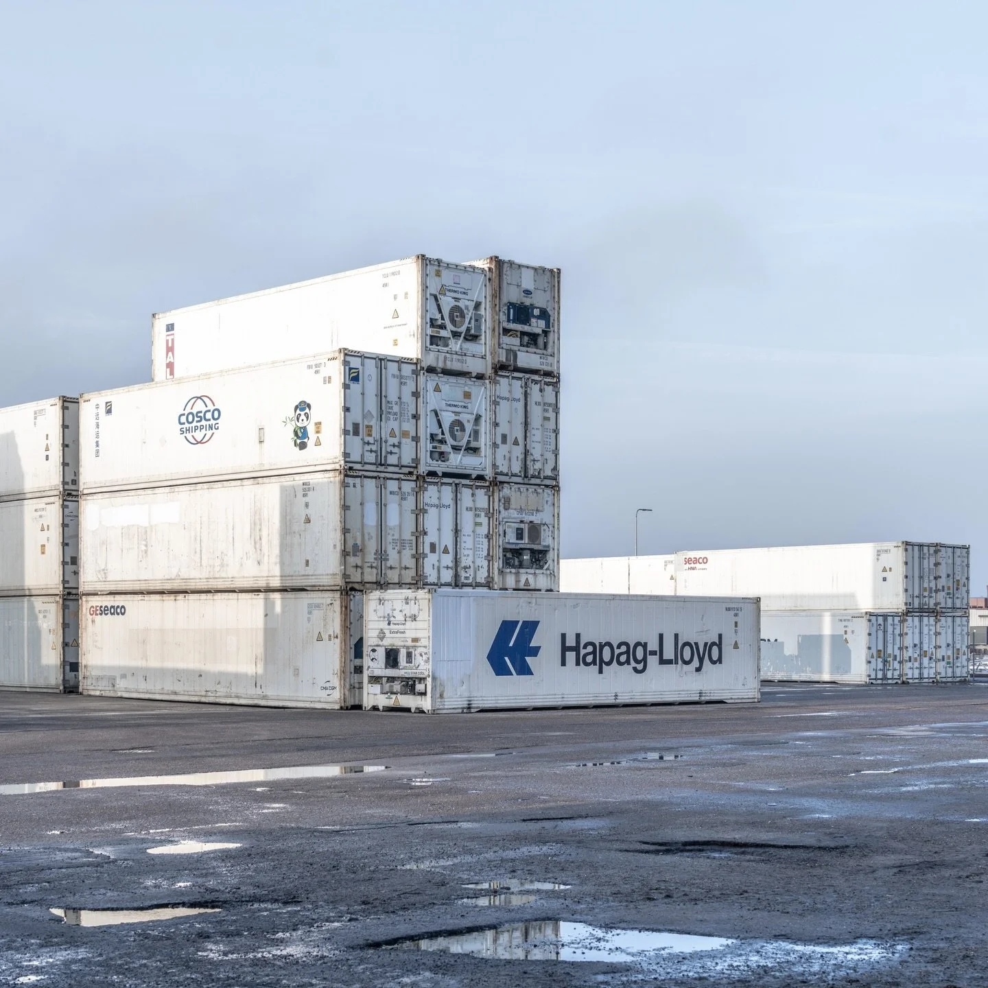 Stacked geometry in muted tones. Industrial vessels stripped of motion become pure form, their weathered surfaces mapping years of global transit. Minimal compositions emerge where function transcends purpose.
📌 Nordhavn, Denmark
✁&mdash;&mdash;&mda