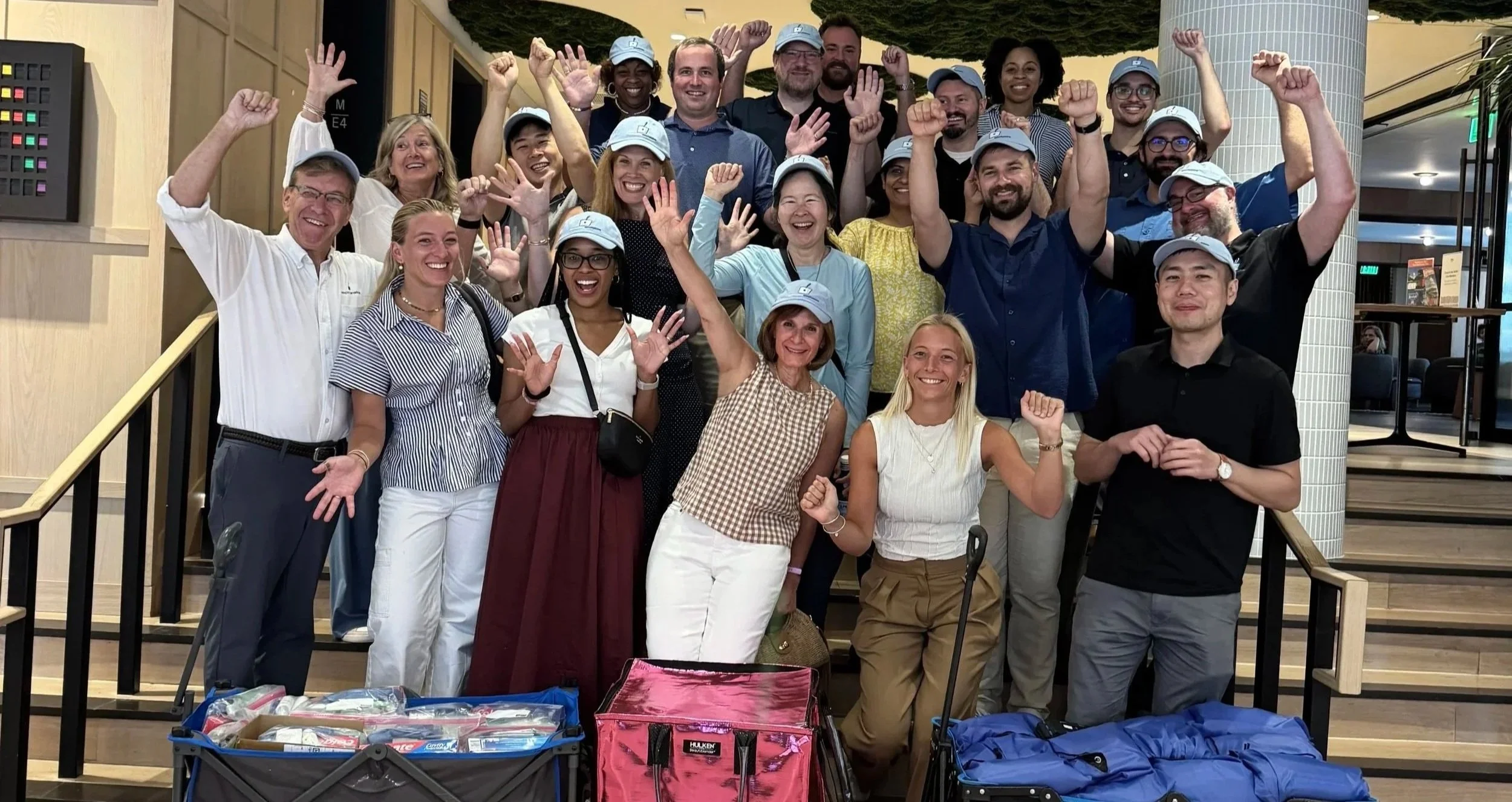 employees had fun together packing over 100 hygeine kits for a local shelter