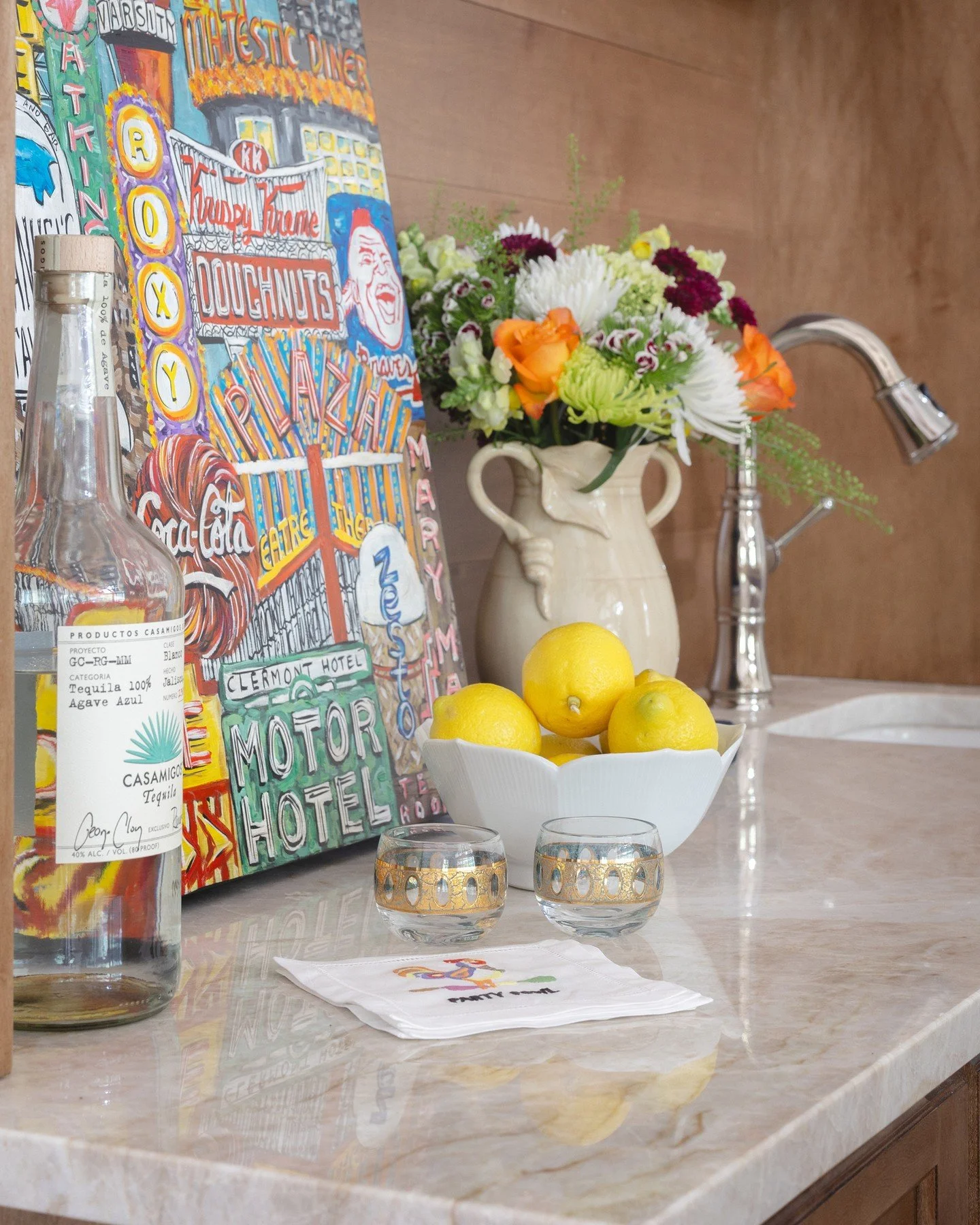 A gracious touch for everyday hosting.⁠
⁠
Tucked into the living room, this bar was designed to feel both effortless and elevated&mdash;ready for impromptu gatherings and slow evenings alike. Warm wood tones, layered textures, and a curated mix of me
