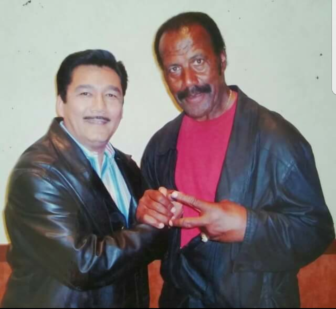 Actor and professional American football player Fred Williamson 