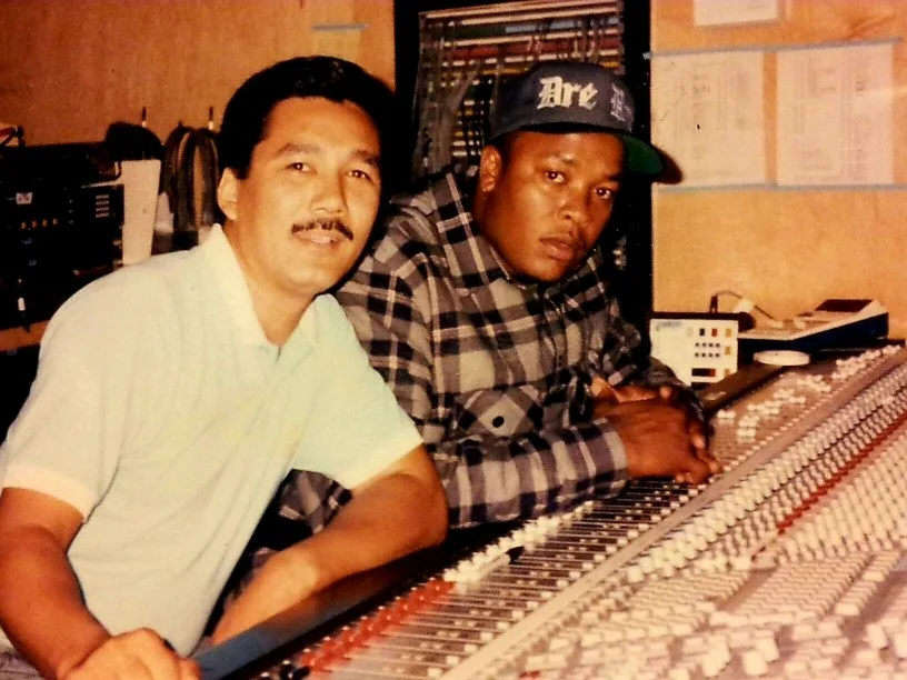 Dr. Dre during a studio session on The Chronic rap album. Snoop is sleeping on the floor behind us.