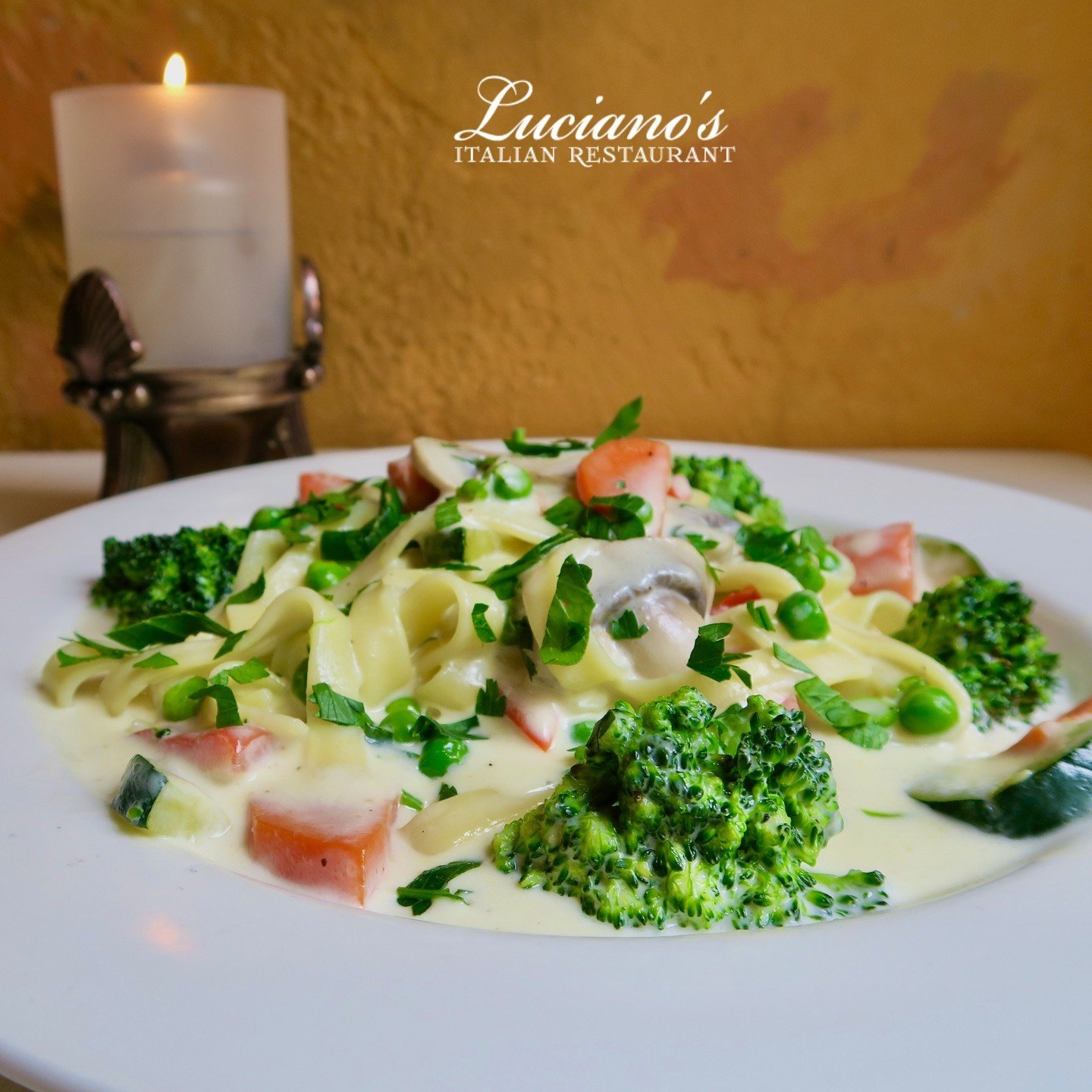 Pasta Primavera: Fresh veggies and smooth Alfredo blend for a perfect meal.