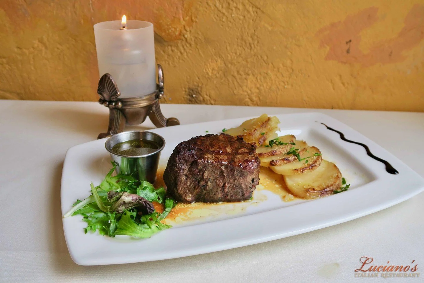Treat yourself to our incredible Filet!

9 oz Prime Filet Charbroiled to your liking, served with Luciano's own Homemade Zip Sauce!