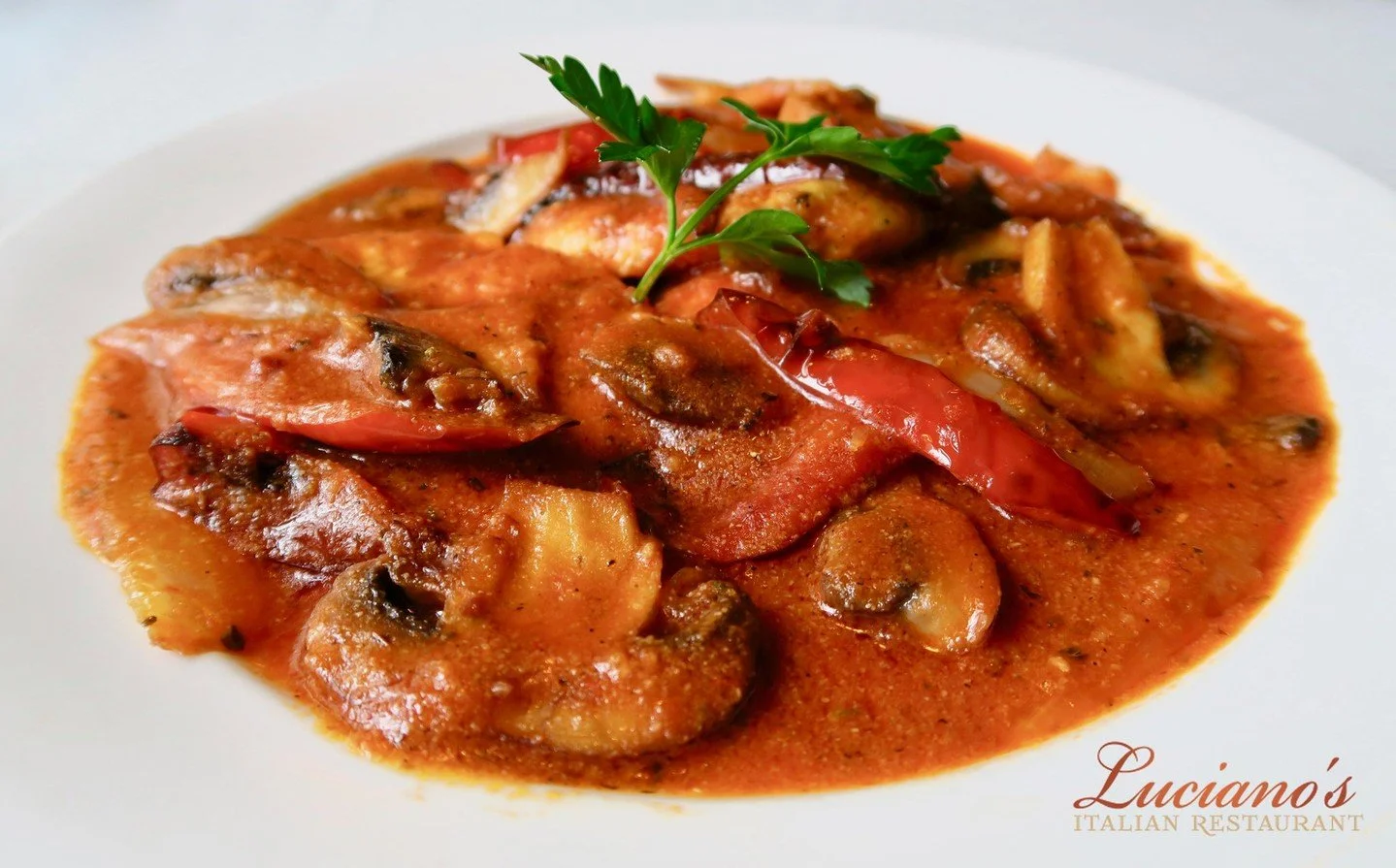 What's for dinner tonight? Cozy up with an order of our Chicken Cacciatore! Sauteed chicken medallions with peppers and mushrooms in a red tomato sauce. Delicious!