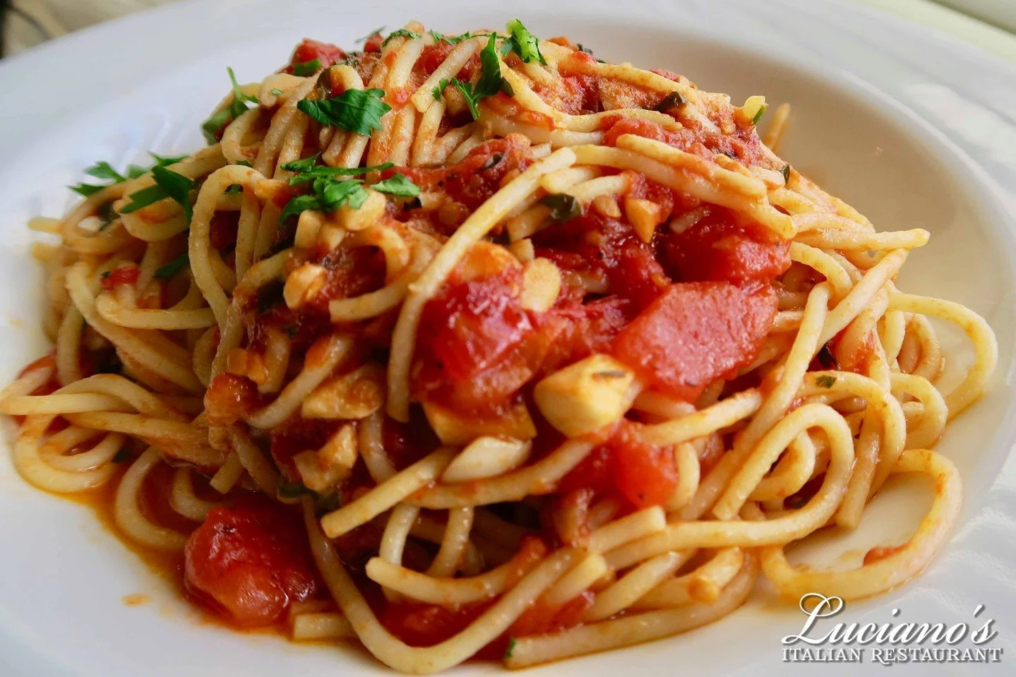 Spaghetti Napoletana - A full bodied red sauce made with basil and garlic. Add some ricotta cheese for an extra dose of deliciousness!