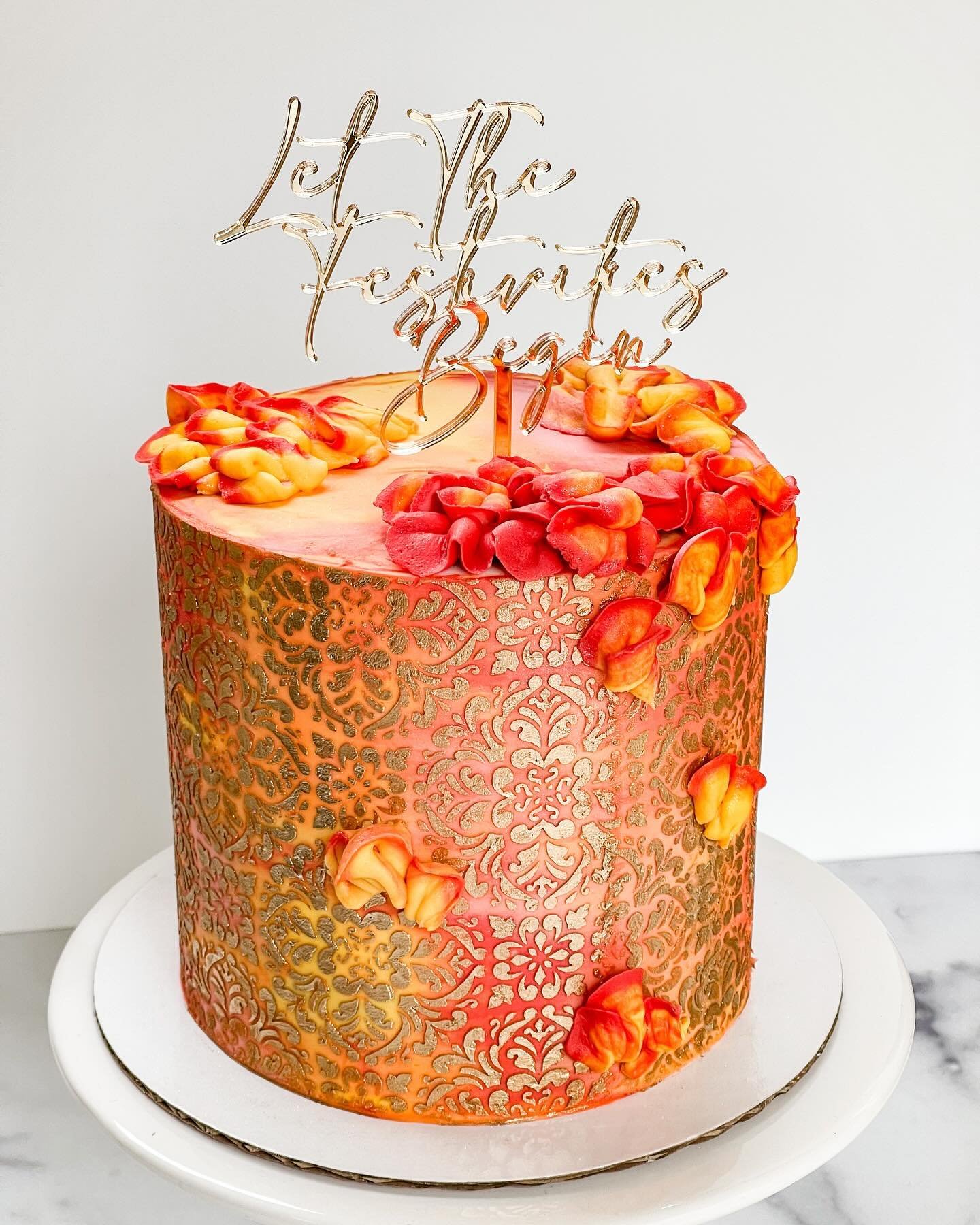 Haldi cake 💛

so in love with finally attempting a gold stencil with the best @caking_it_up 

6&rdquo; three layer cake with watercolor red/orange/yellow/pink buttercream, gold @caking_it_up stencil, piped texture &amp; @floraldust_ acrylic cake top