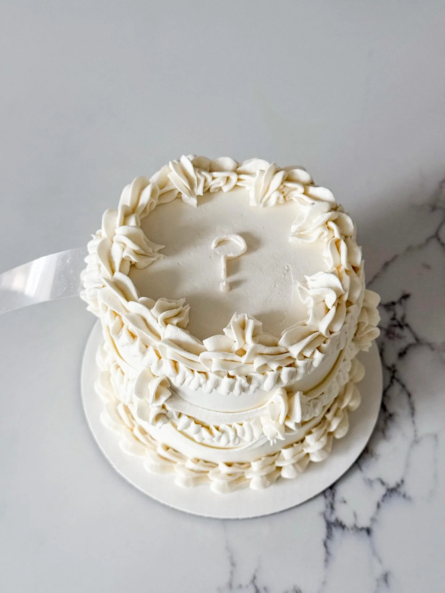 gender reveal pull tab 🩵🩷

how cute is this pull to reveal style! my customer had such a vision &amp; it turned out perfectly.

gender reveal cake / gender reveal / pull tab / buttercream cake / custom cake / local baker / rancho cordova / sacramen