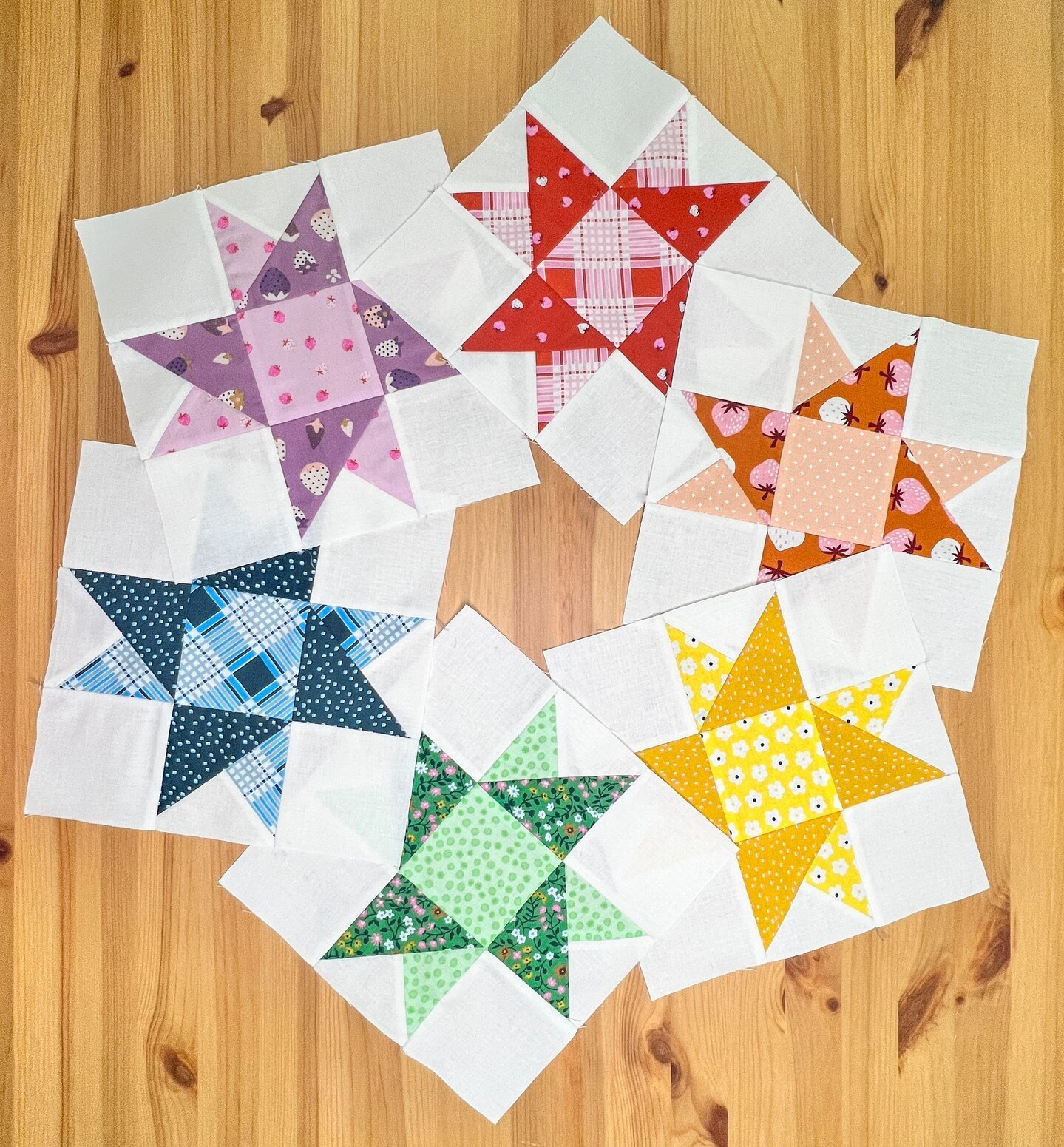 A rainbow of strawberry stars! 🍓⭐😊⁣
.⁣
I'm excited to show you how neat this quilt is when it all comes together!⁣
.⁣
#quiltblock #sweetpixelquilts #strawberry #fabric #rubystarsociety #quiltblocks #quiltstar #quilting #quilts #quilt #quiltsofinsta