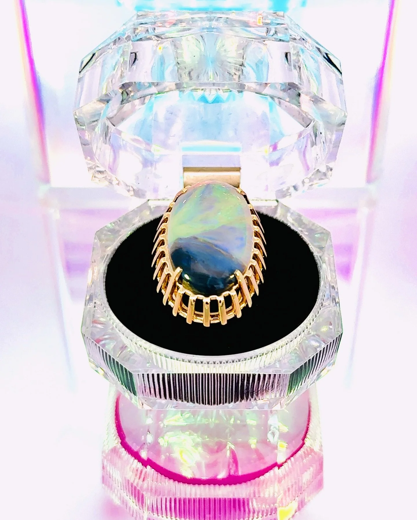 Adore the way this Australian opal glows with the soft hues of an ocean sunrise and the gold setting radiates like the sun&rsquo;s first light, embracing the wearer in a warm, golden embrace. A piece that captures the very essence of dawn, and the be
