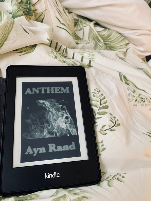 A book and a beverage: Anthem and a layered latte