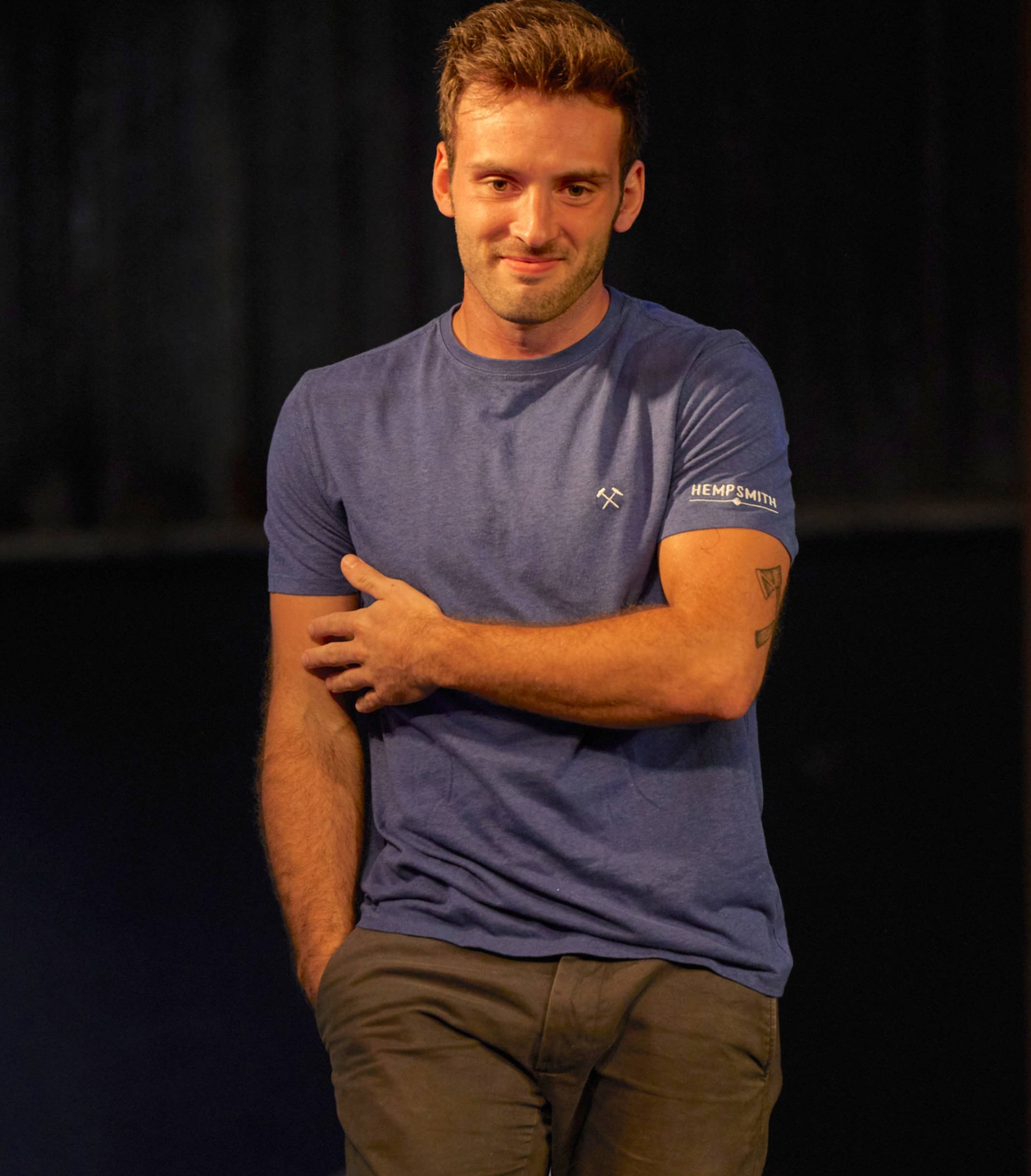 Model showcasing a blue hemp shirt in a runwayfashion show