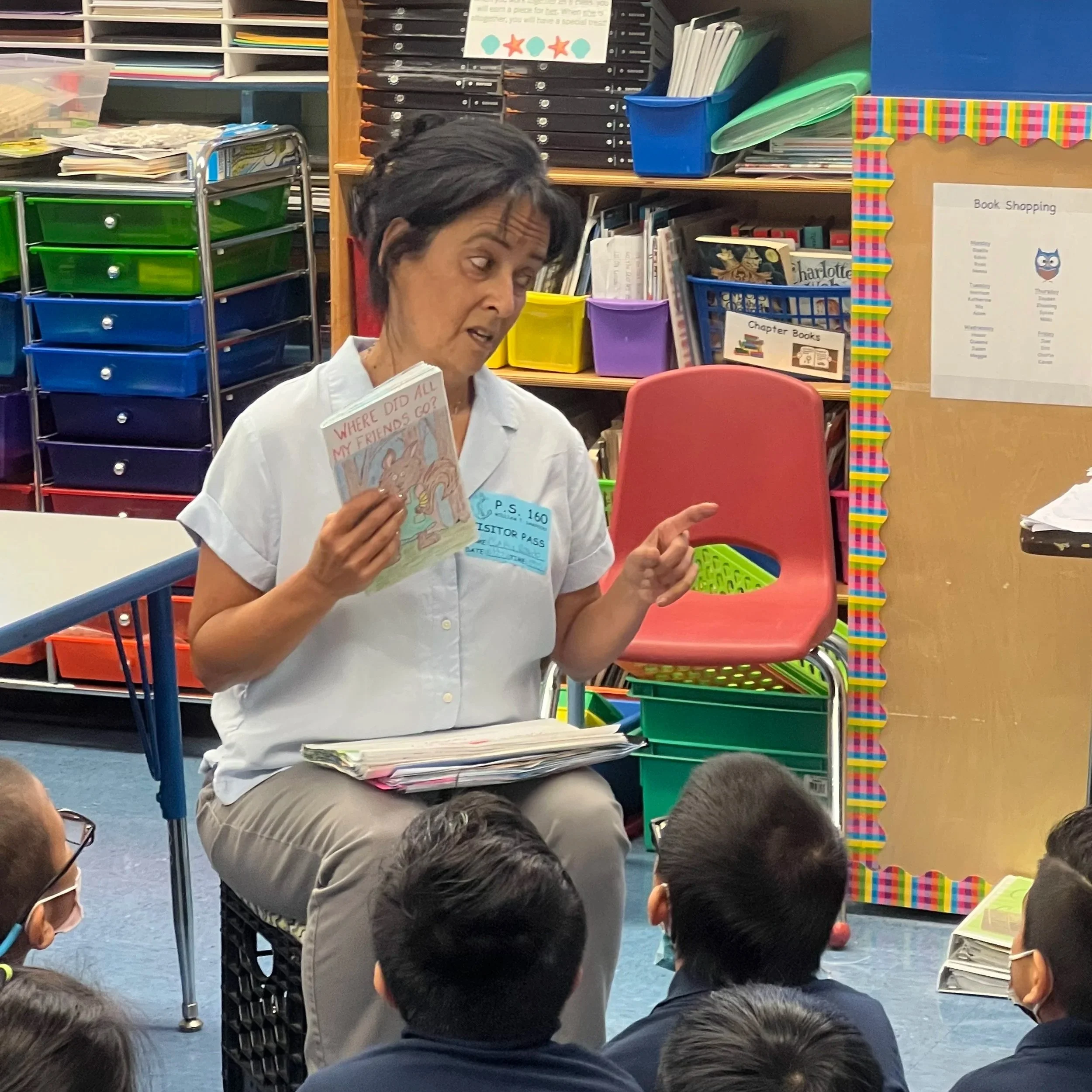 Cynthia reading to a class