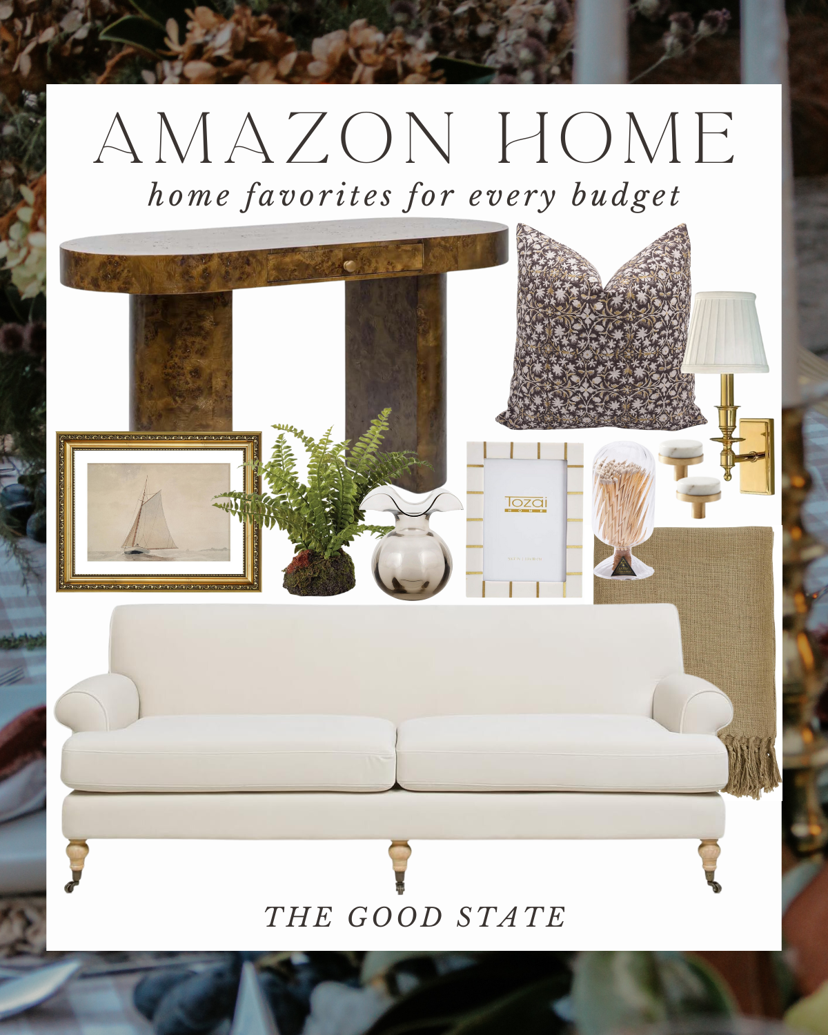 Book cover titled 'Amazon Home: home favorites for every budget,' featuring a white sofa, a framed sailboat painting, a white and silver vase, a potted fern, a patterned throw pillow, a table lamp, a picture frame, a shell decor, and other home inter