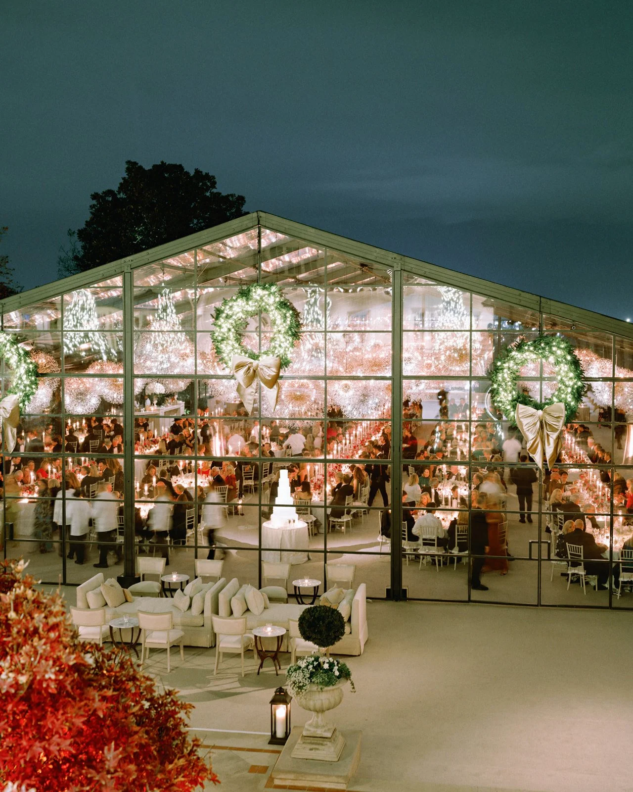 holiday-wedding-tented-pavilion-exterior-wreaths-night.jpg