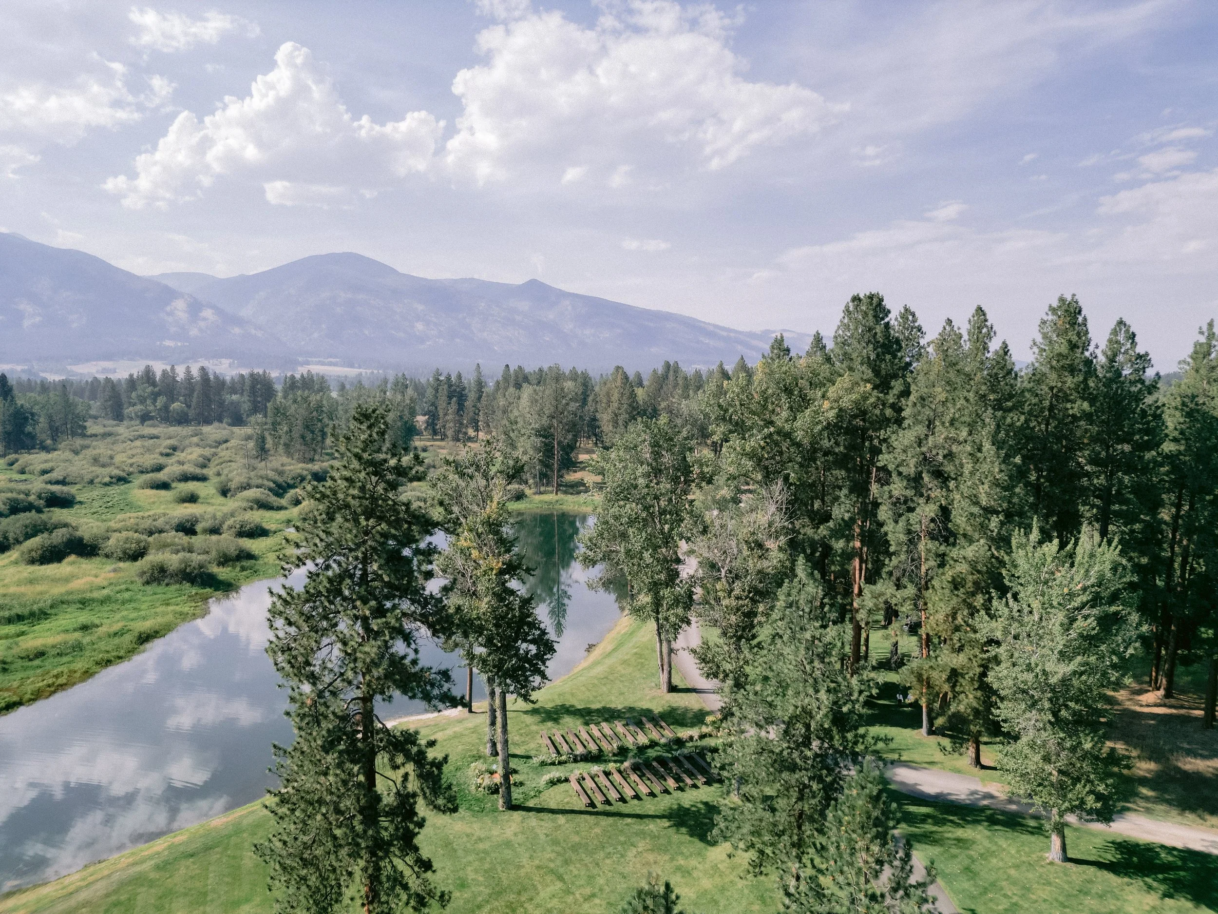 laurie-arons-special-events-montana-ranch-wedding-private-ranch-aerial-lake-mountains-ceremony-site-montana.jpg