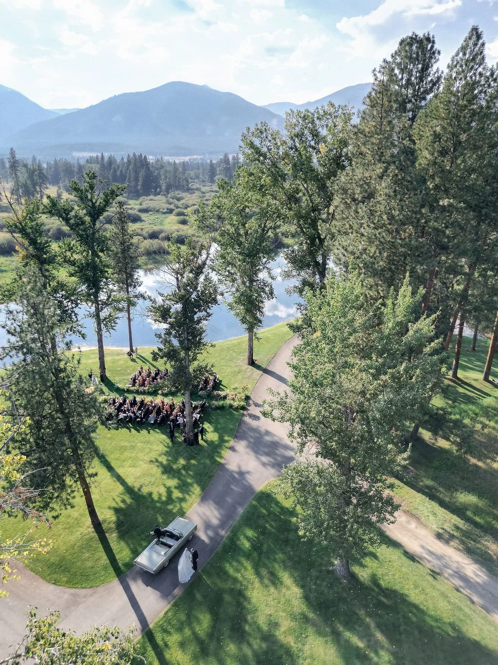 laurie-arons-special-events-montana-ranch-wedding-mint-green-vintage-convertible-unforgettable-ceremony-entrance-aerial.jpg