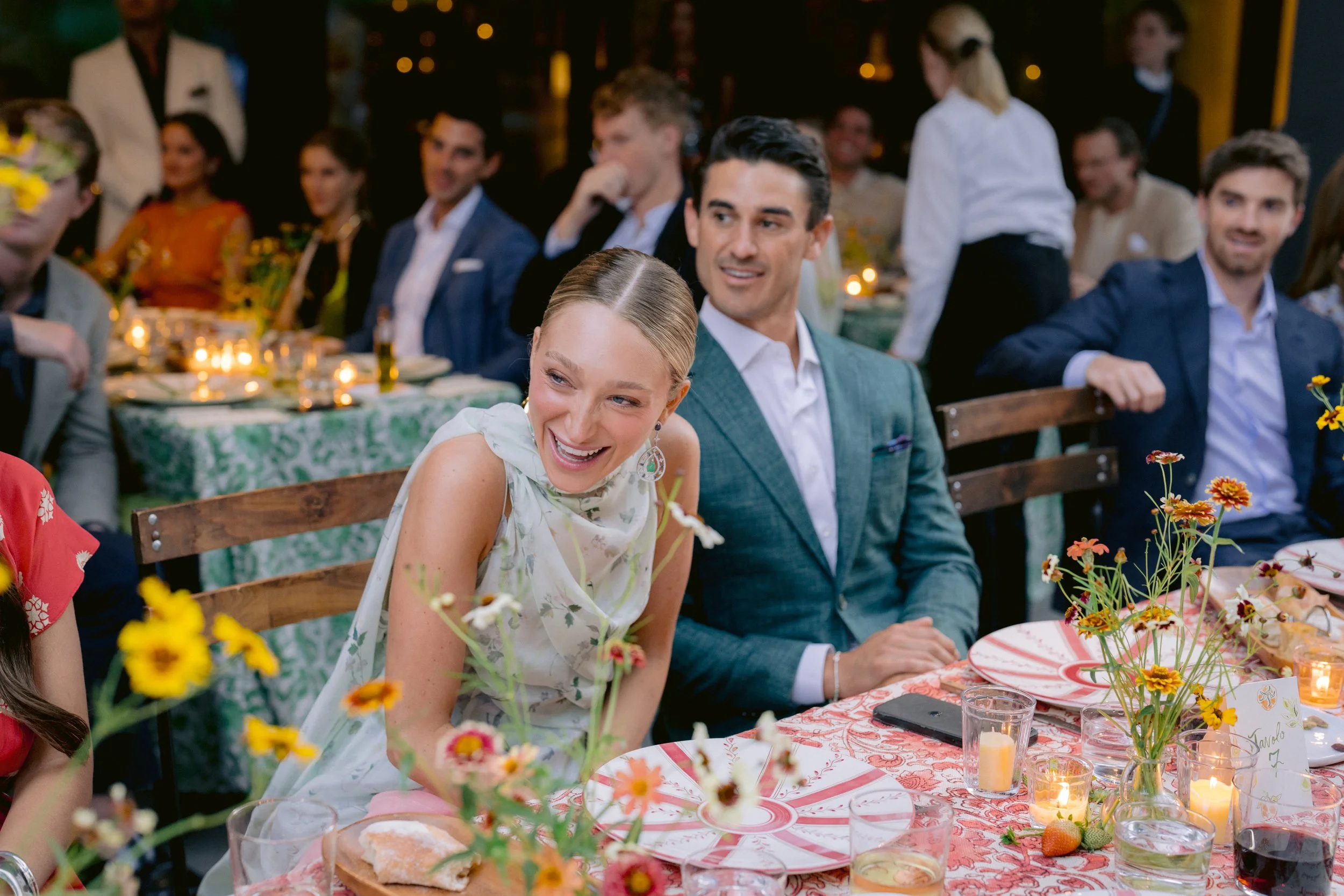 flowers-winery-california-wedding-bride-groom-reception-laughter.jpg