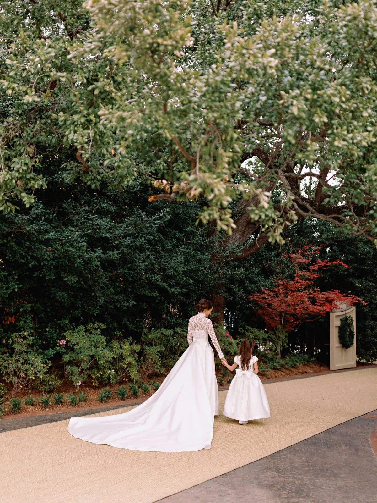 holiday-wedding-bride-flower-girl-garden-walk.jpg