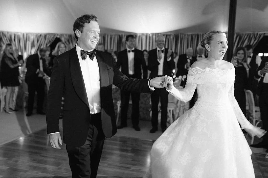 laurie-arons-special-events-montana-family-estate-wedding-first-dance-bride-groom-lace-gown-tented-wedding-black-and-white.jpg