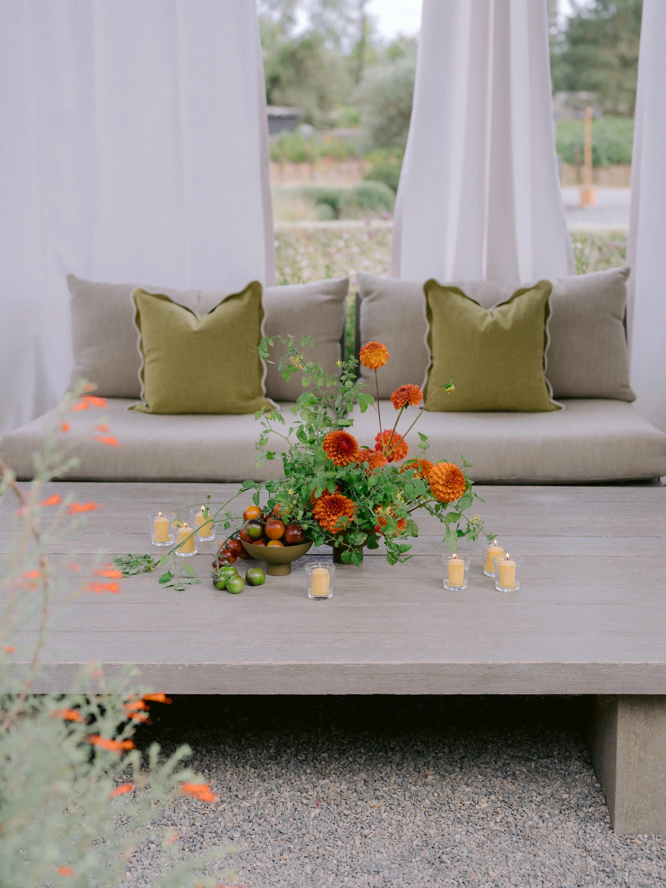 citrus-inspired-event-design-dahlia-tomato-centerpiece.jpg