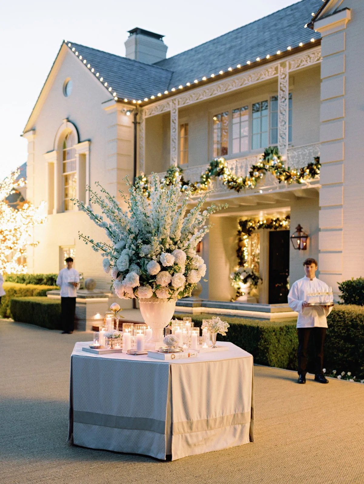 tented-wedding-starburst-chandeliers-pink-florals.jpg