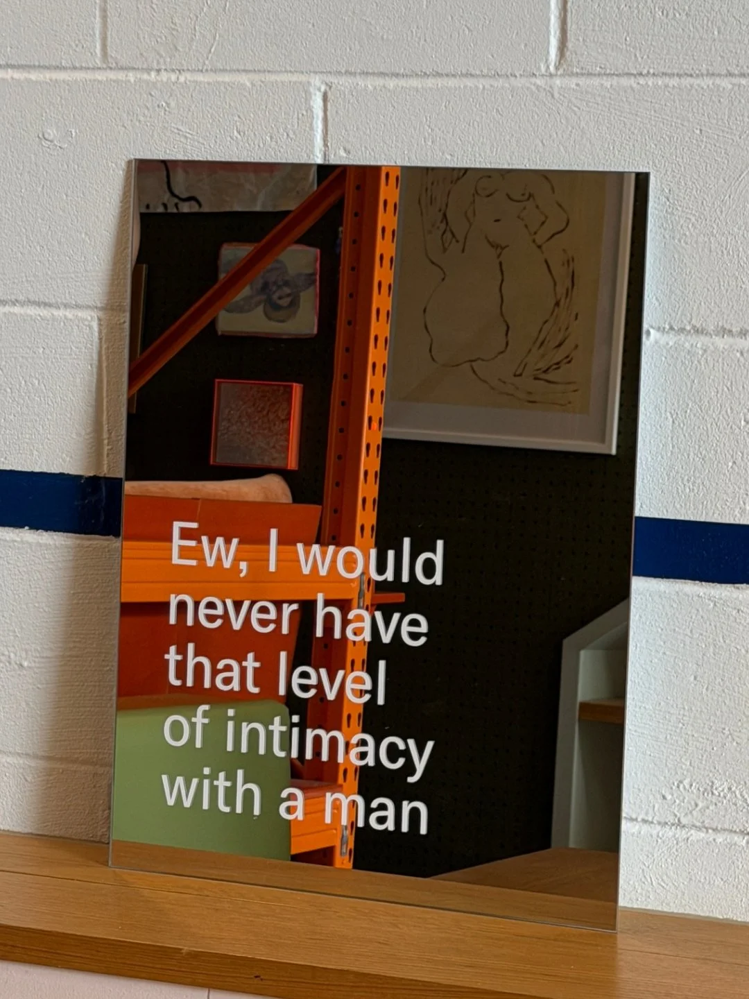 SOLD | Ew, Laura Brinin, 2026, vinyl secrets from spoken conversation on mirror, 48 x 60 cm, $280, Not Framed