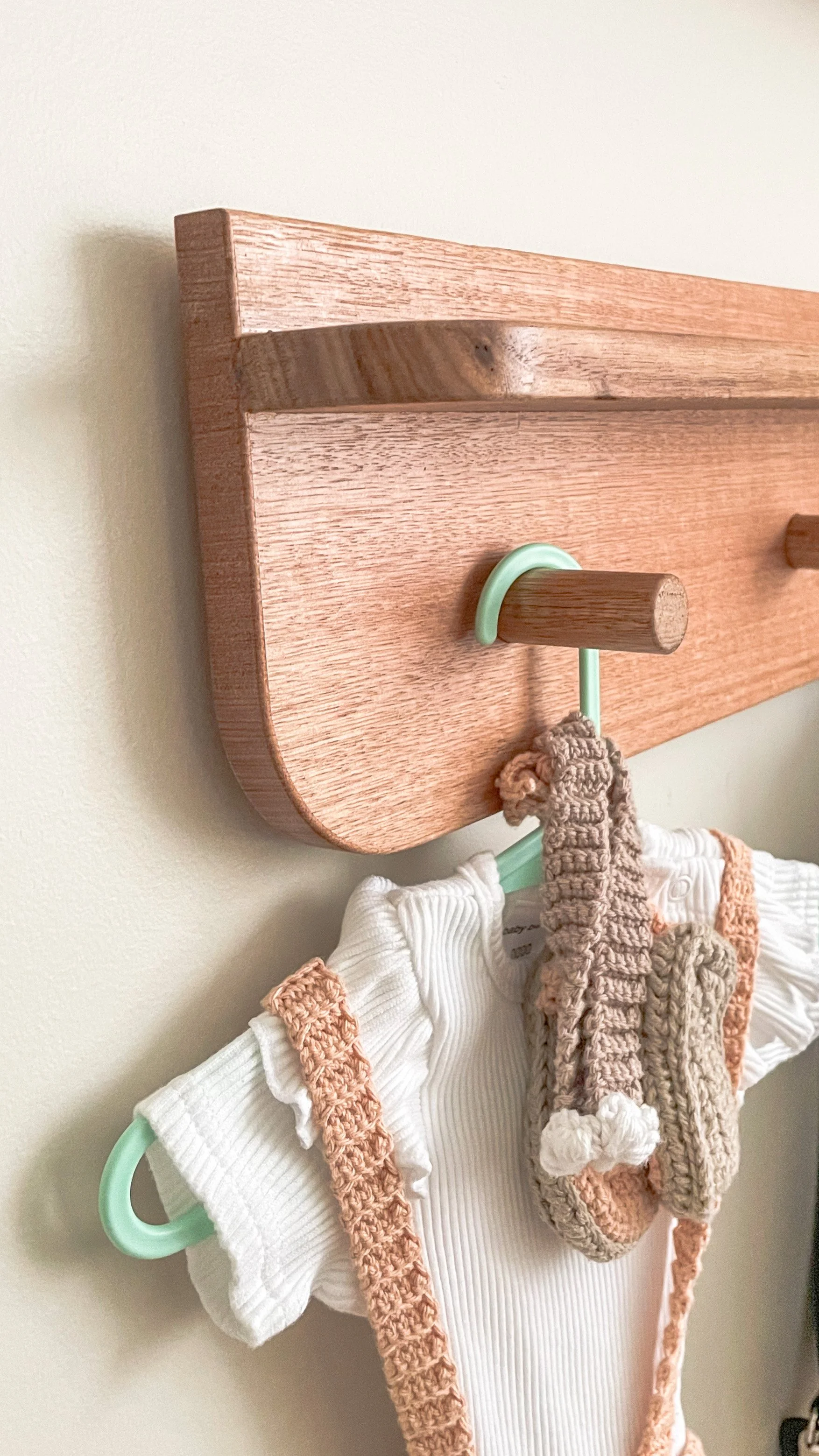 Hardwood Hook, Holding crochet baby girls outfit