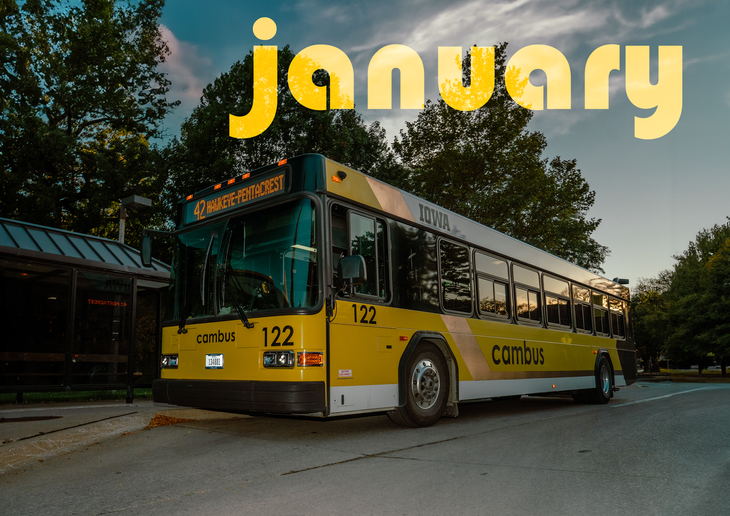 A CALENDAR PAGE OF A YELLOW CITY BUS THAT SAYS "JANUARY"