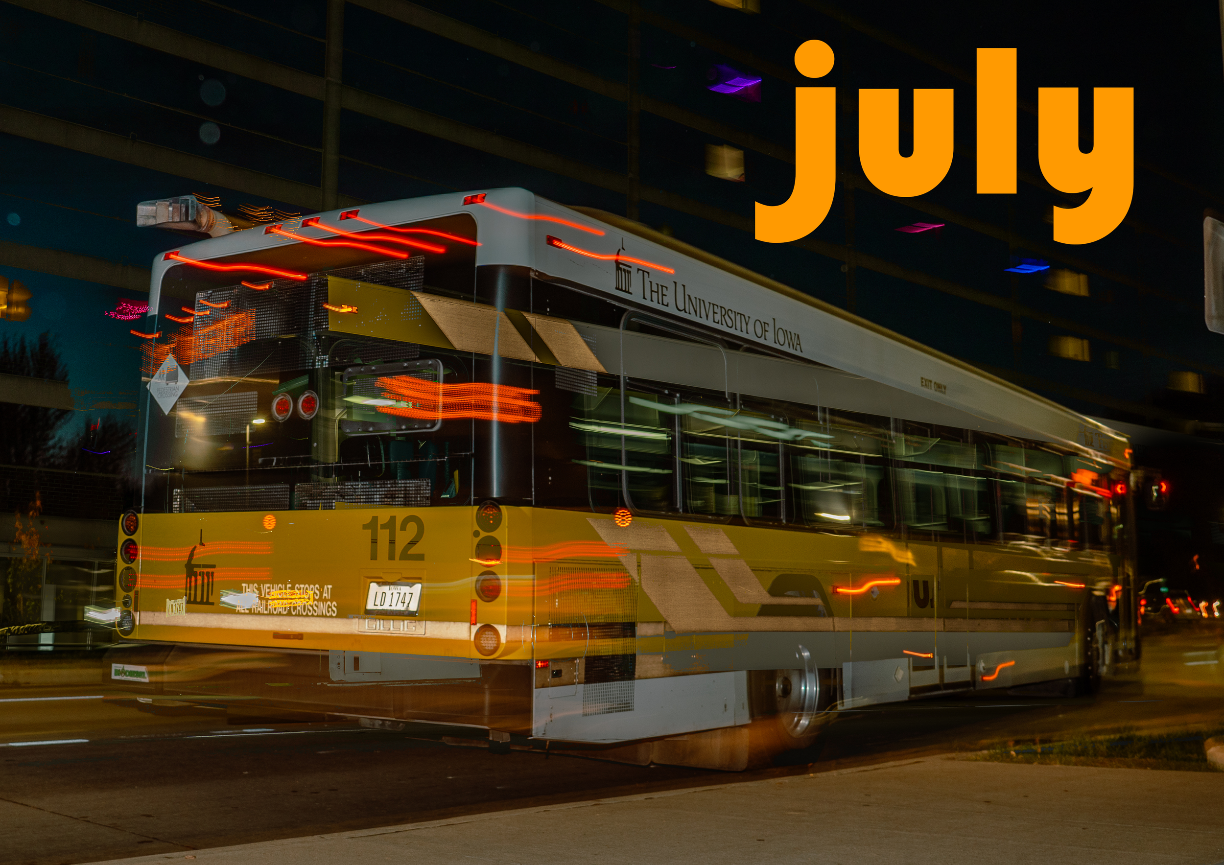 A CALENDAR PAGE OF A YELLOW CITY BUS THAT SAYS "JULY"