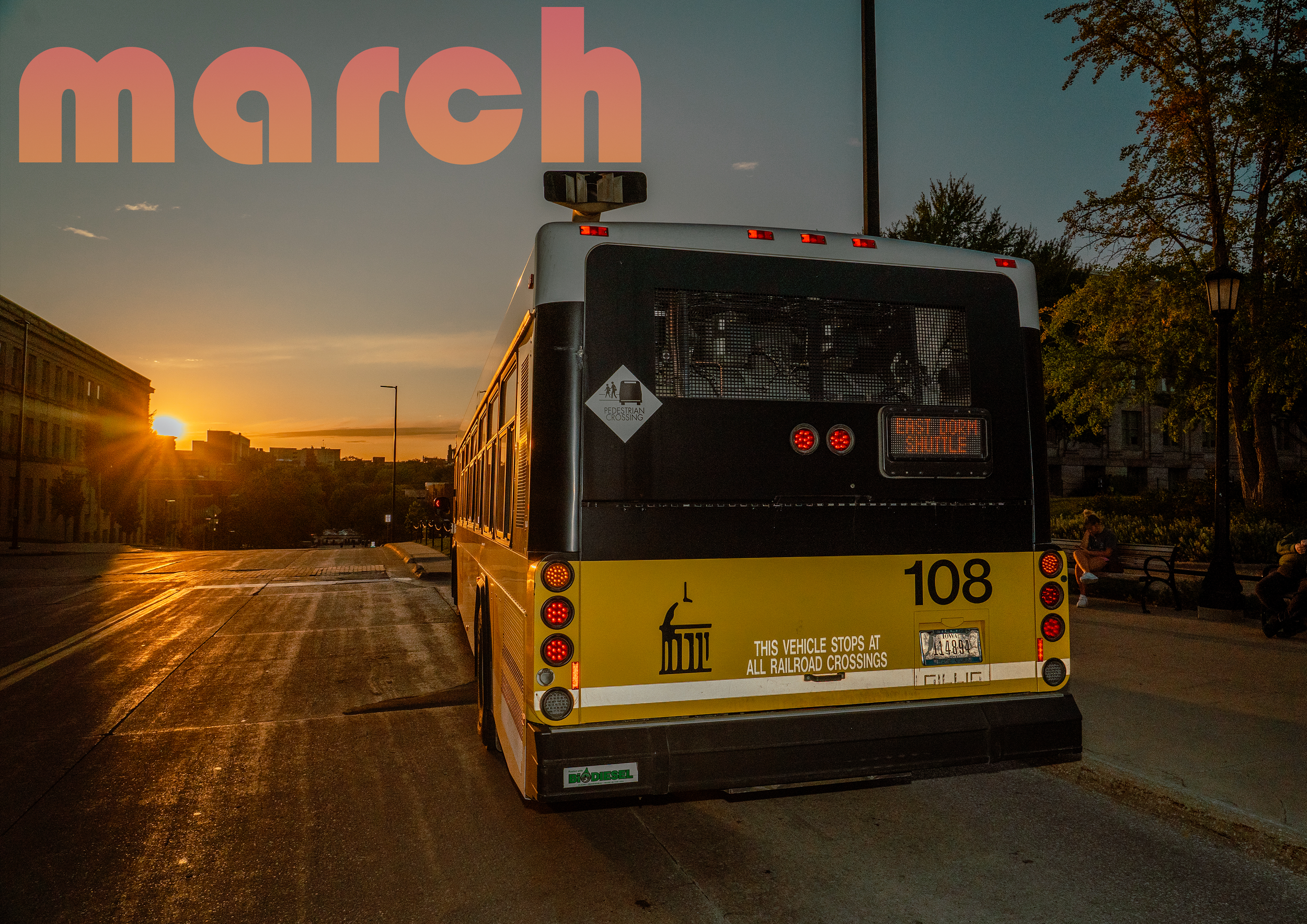 A CALENDAR PAGE OF A YELLOW CITY BUS THAT SAYS "MARCH"