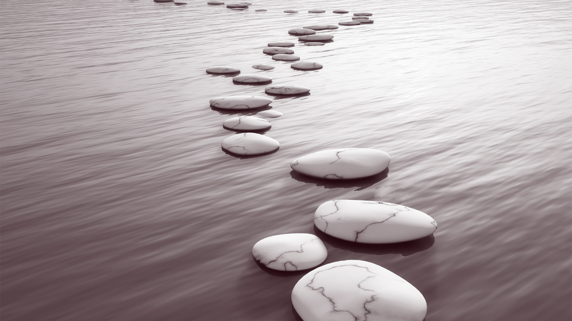 Stepping stones forming a path, representing repeated money patterns and reflection over time for couples.