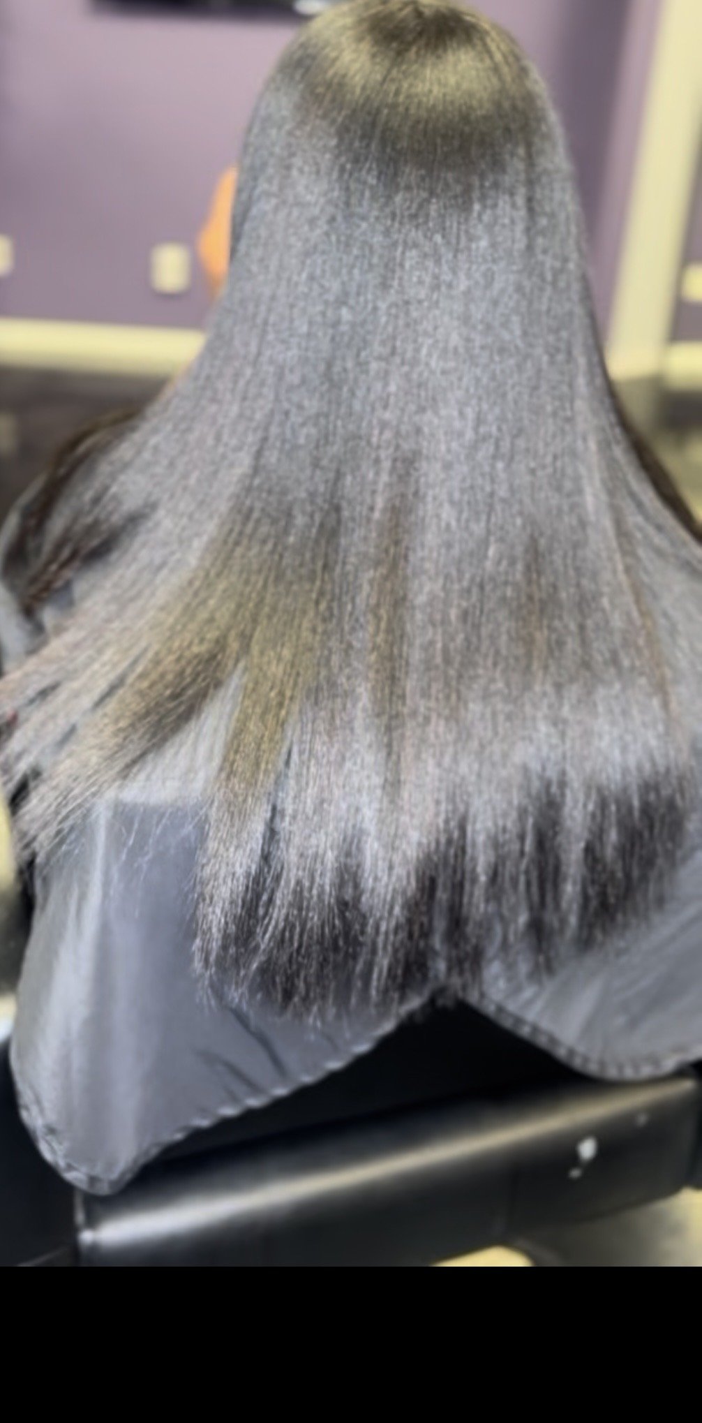 silk press on natural hair in Jacksonville, NC by professional stylist