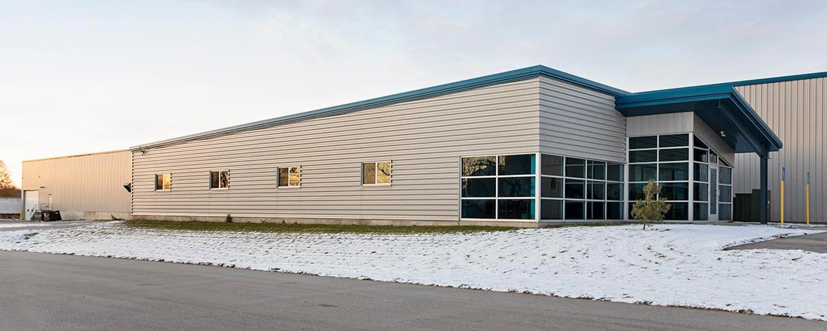 Steel Studs with Steel Siding and Storefront Windows