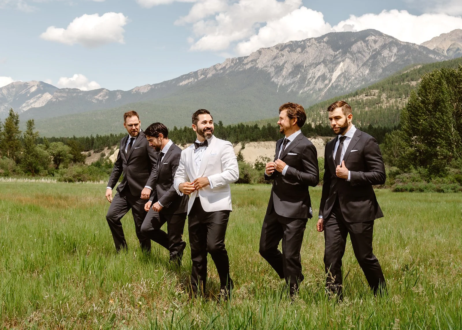 Romantic Mountain Wedding: Groom and Groomsmen in the Fields 