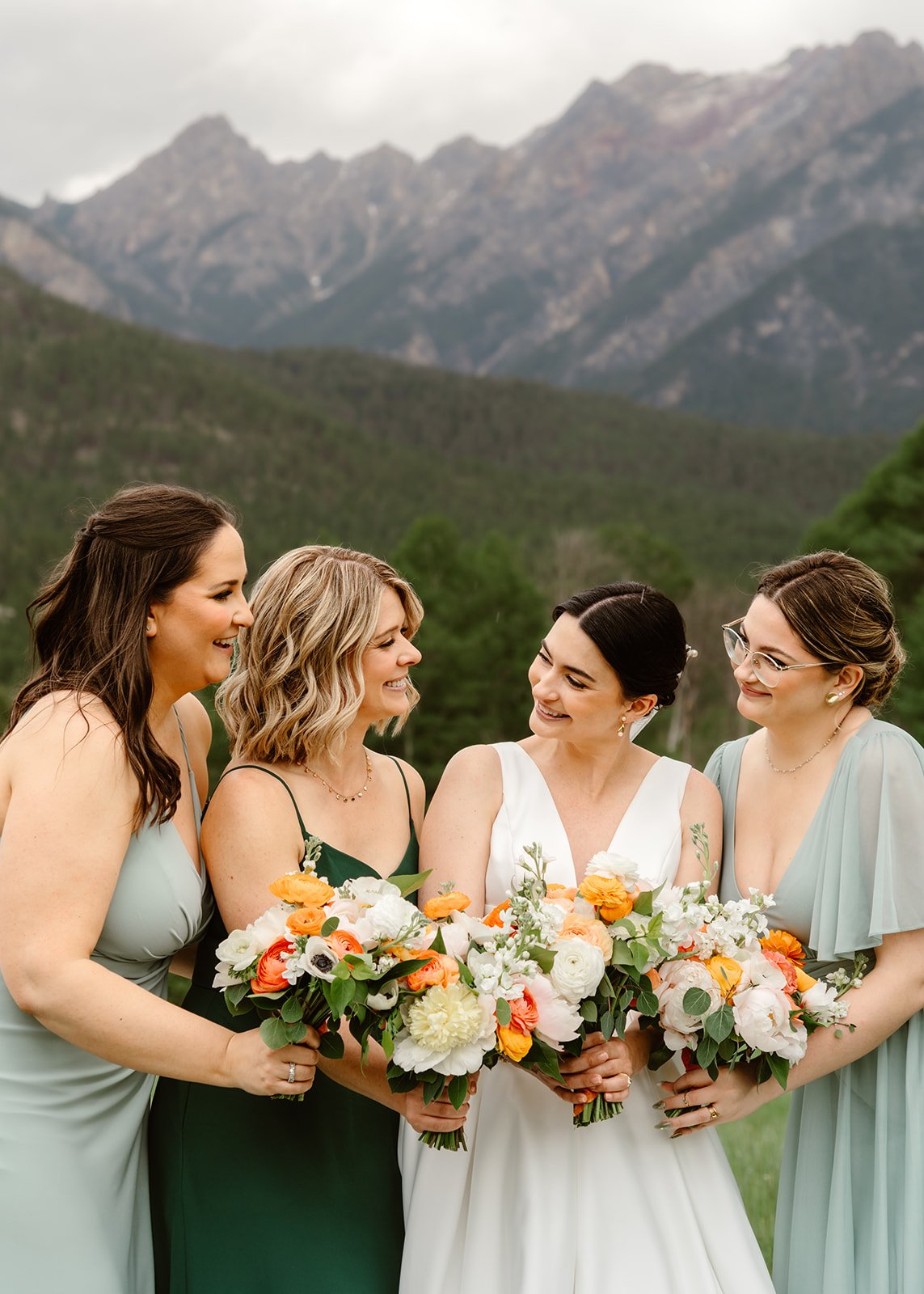 Romantic Mountain Wedding: Bride and Bridesmaid with Bouquets