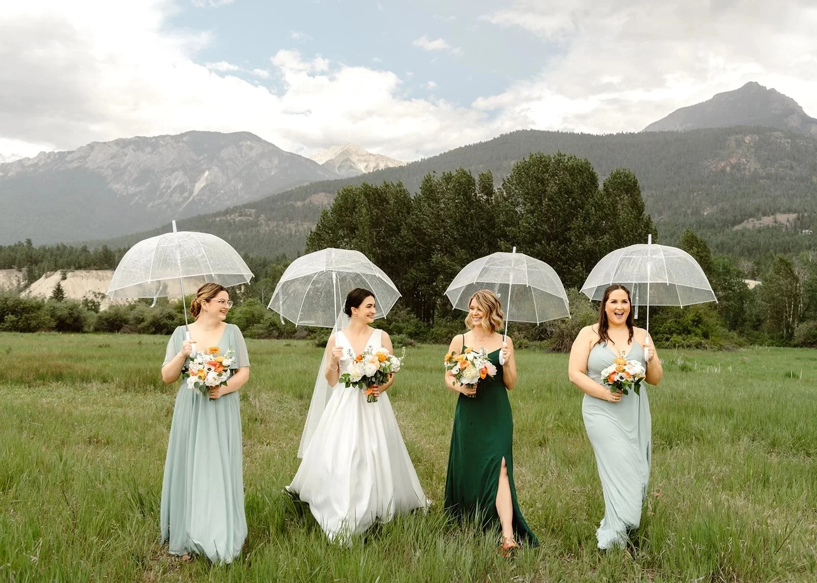 Romantic Mountain Wedding: Bride and Bridesmaid in Rain