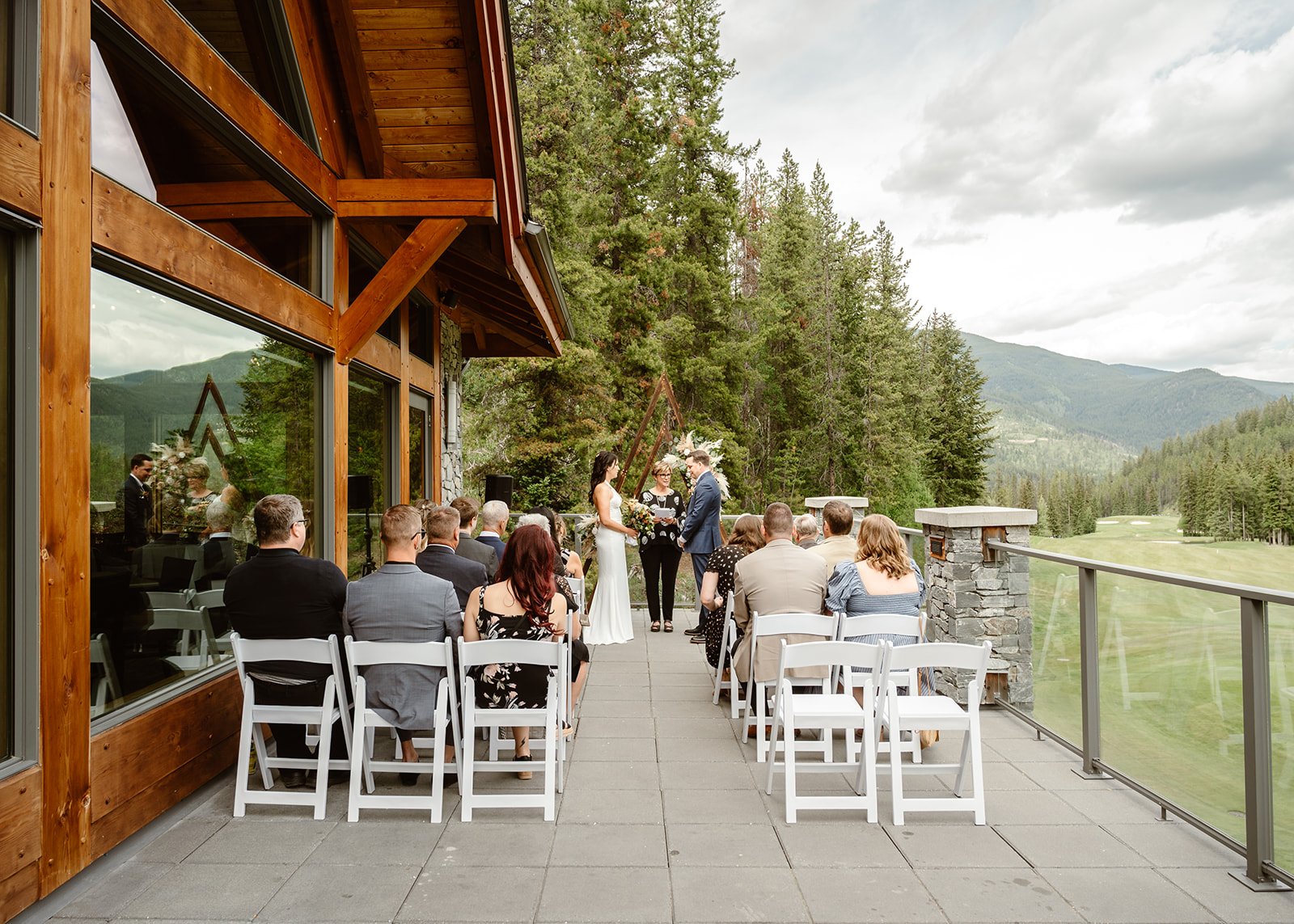 A couple at the altar during an intimate restaurant elopement