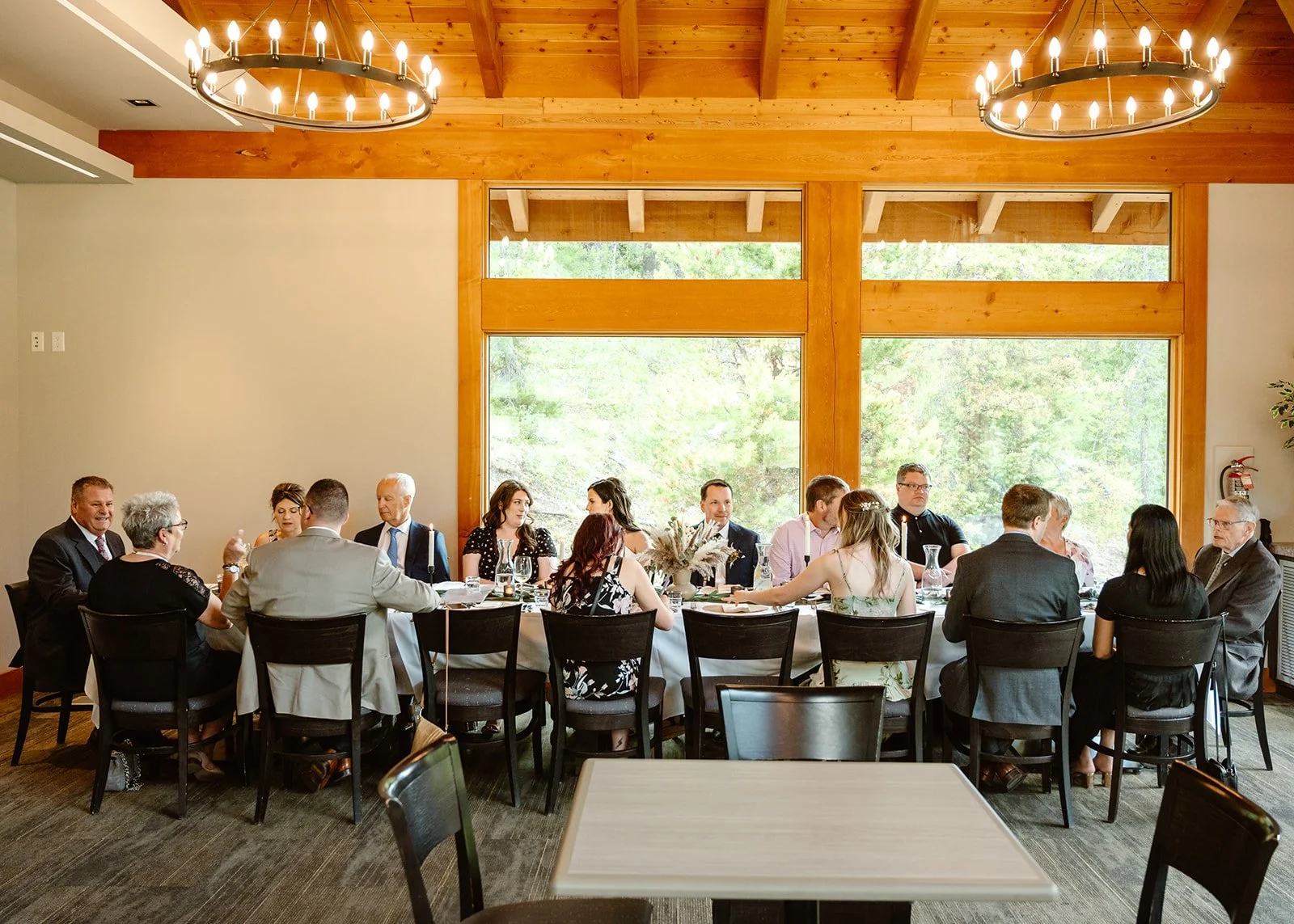Intimate dinner reception at a microwedding restaurant elopement overlooking the golf course
