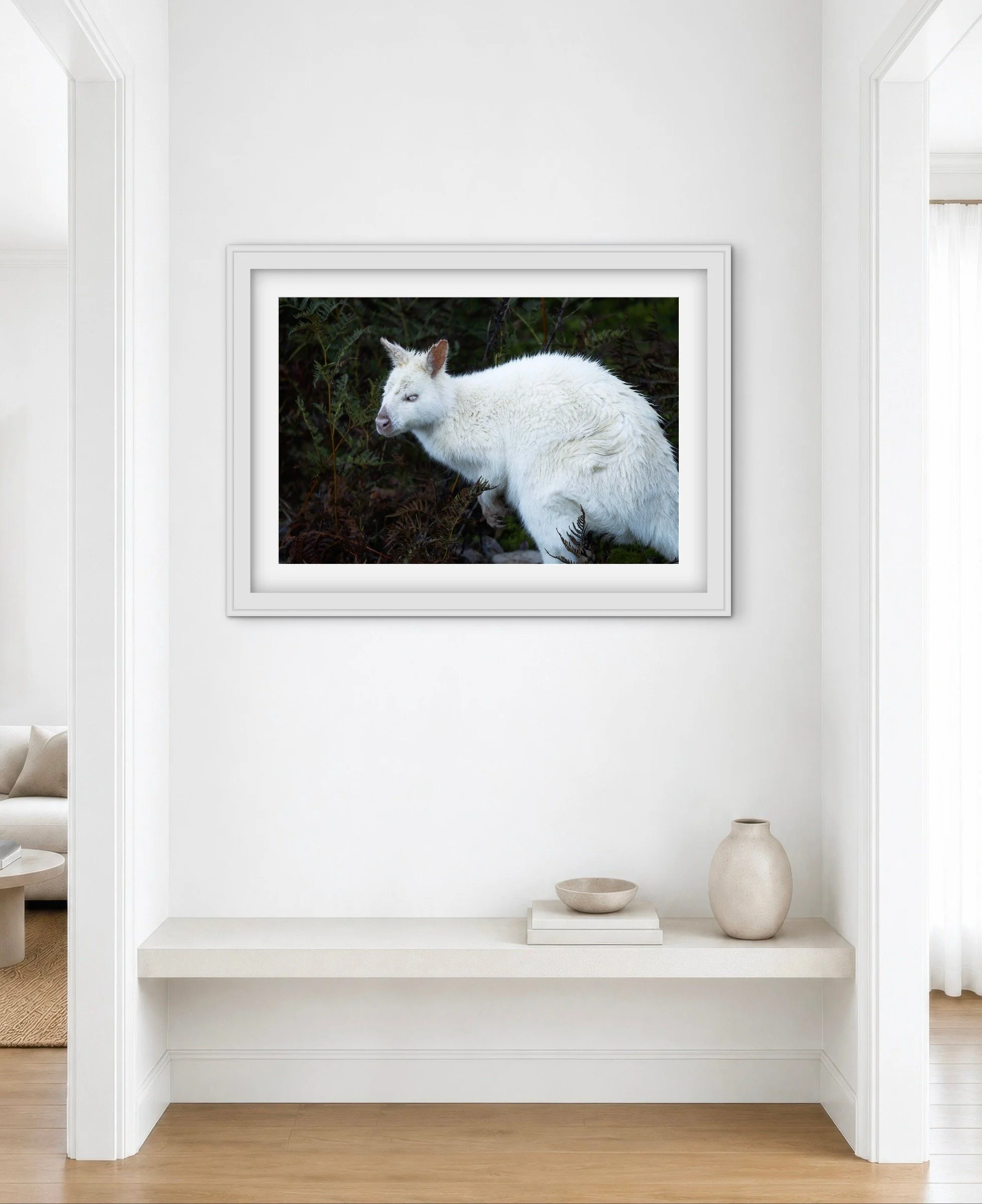Room mock-up showing White Wallaby as framed wall art.